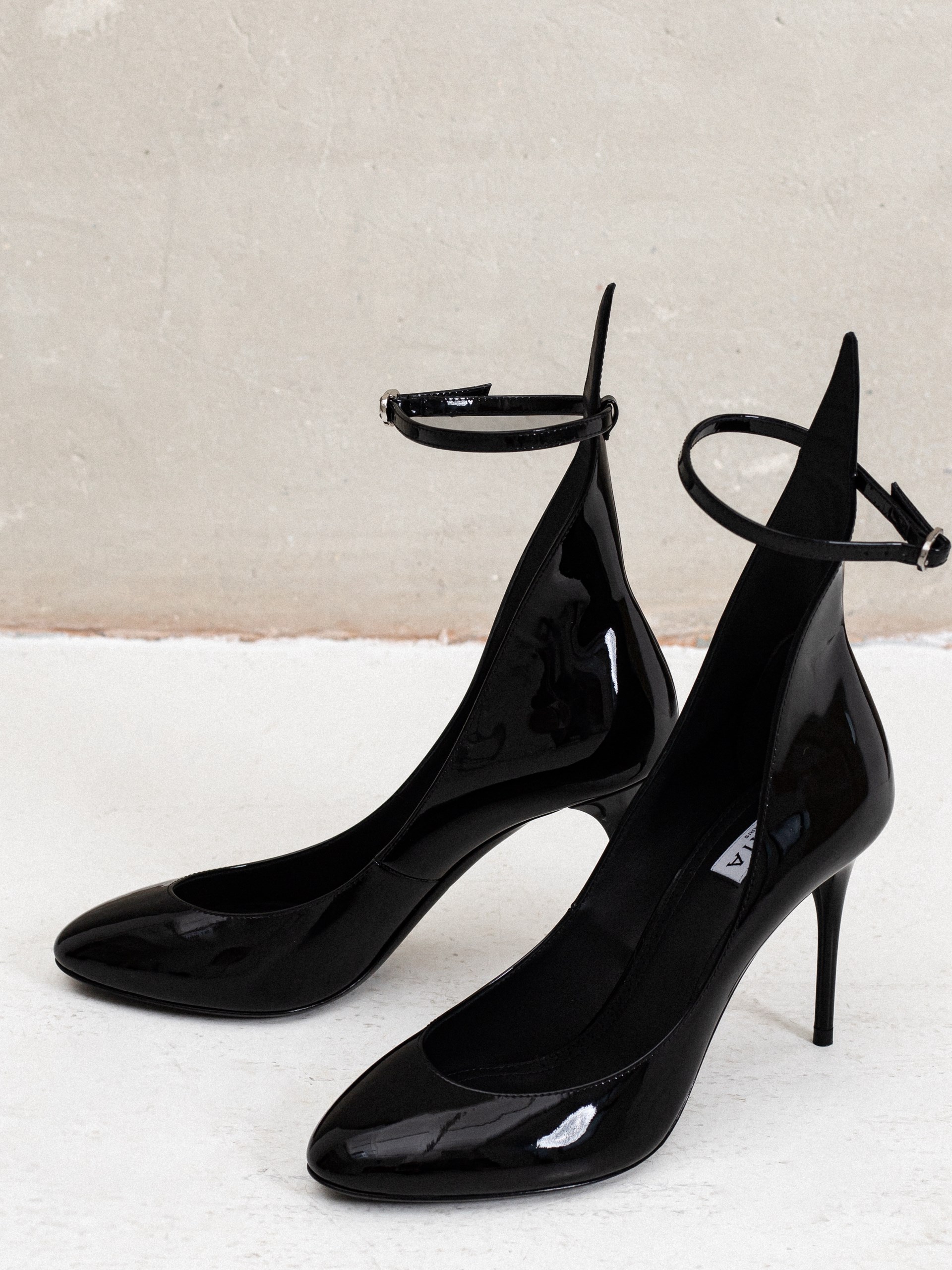 Alaïa black patent leather strappy shoes