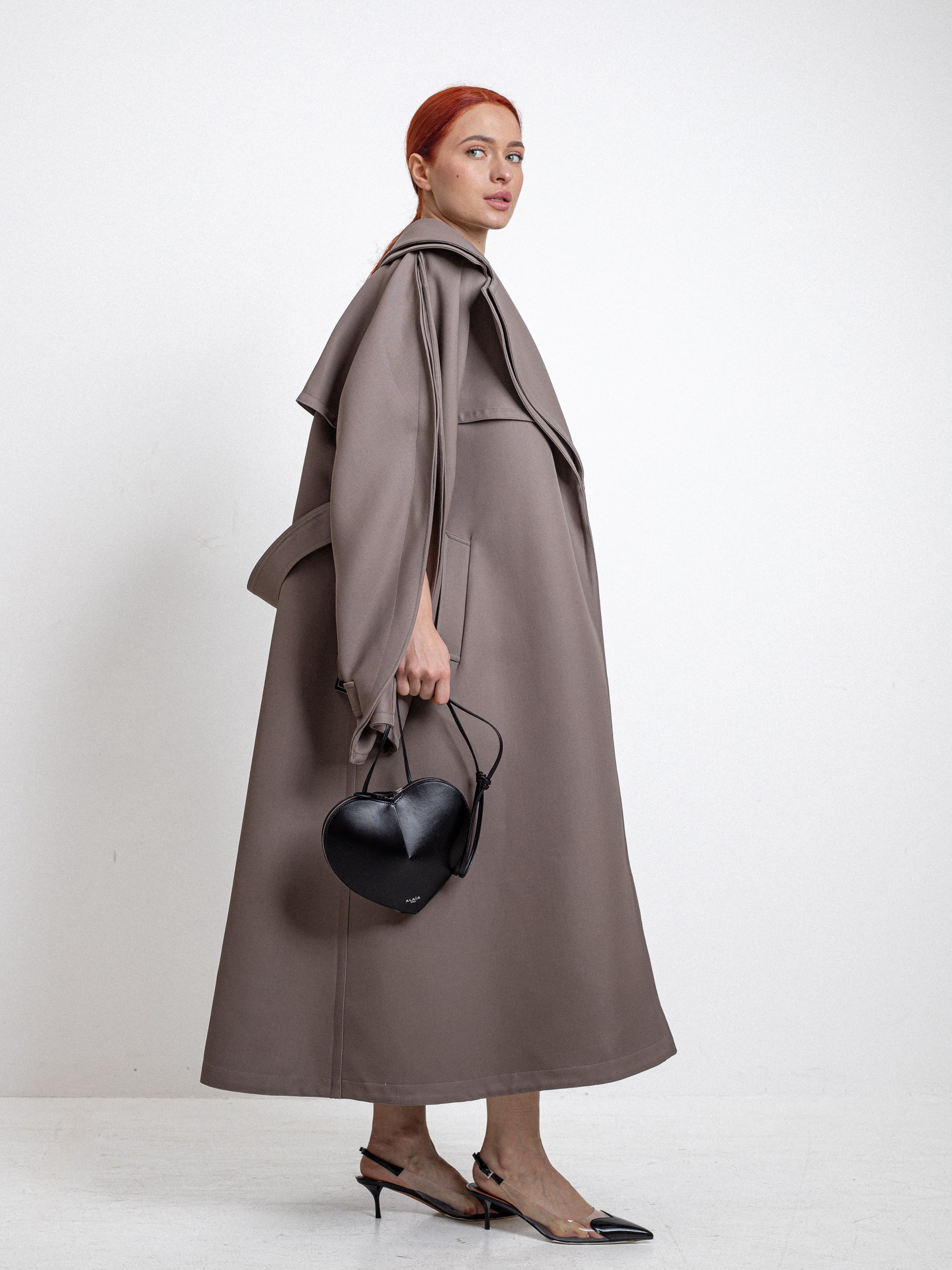 Alaїa gray-brown trench coat with slits on the sleeves