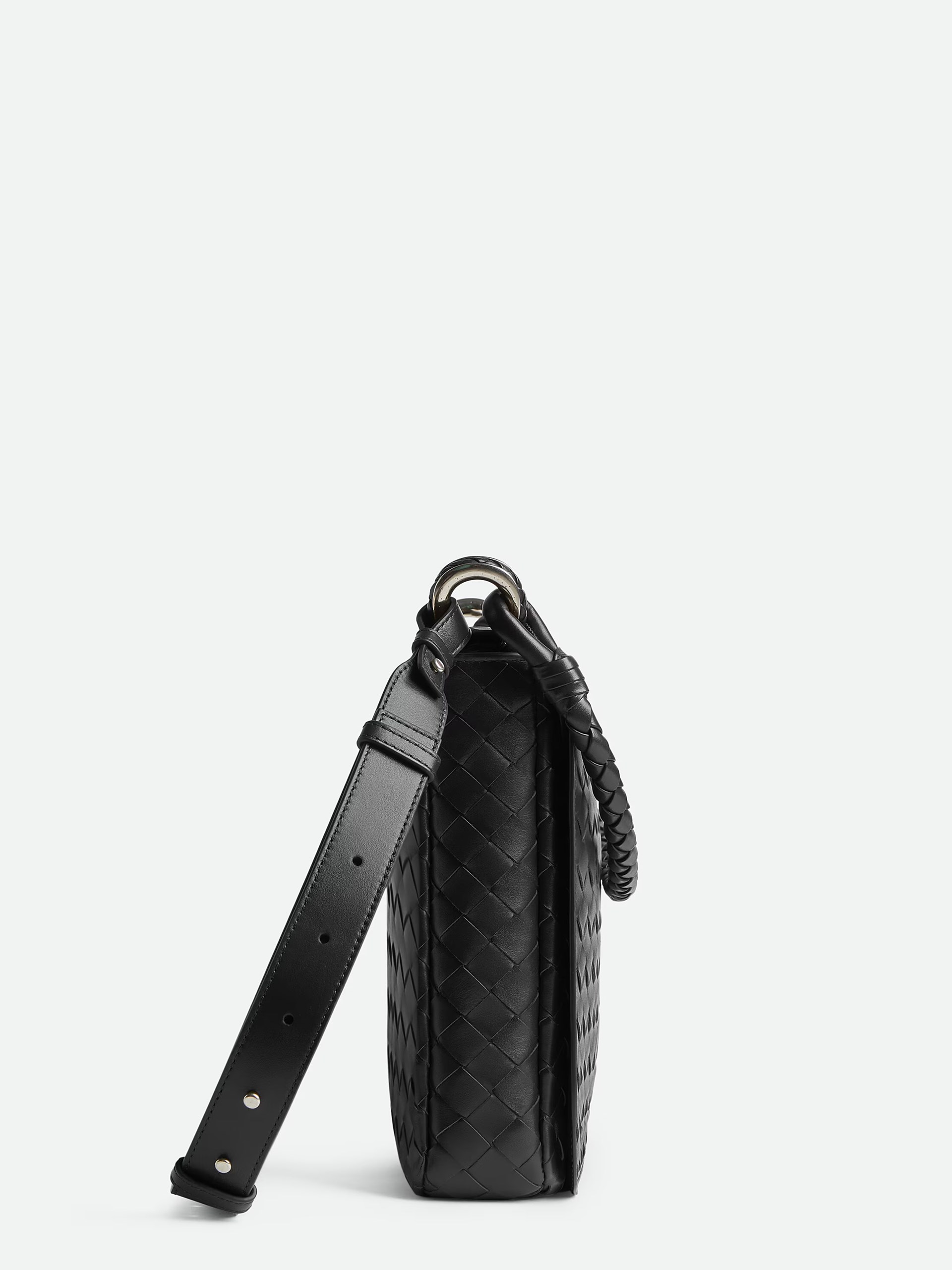 Black men's Bottega Veneta Swing Messenger bag in soft Intrecciato leather