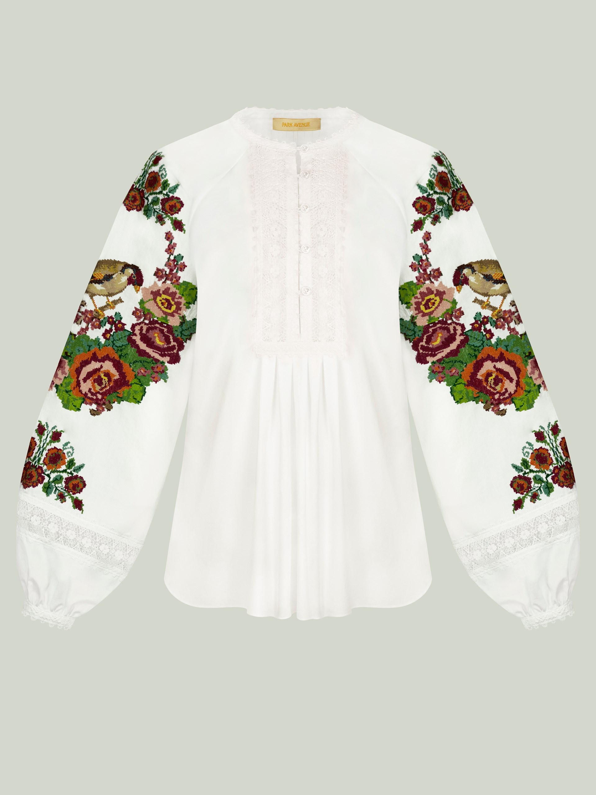 Park Avenue Atelier embroidered shirt with loose cut and hand embroidery elements