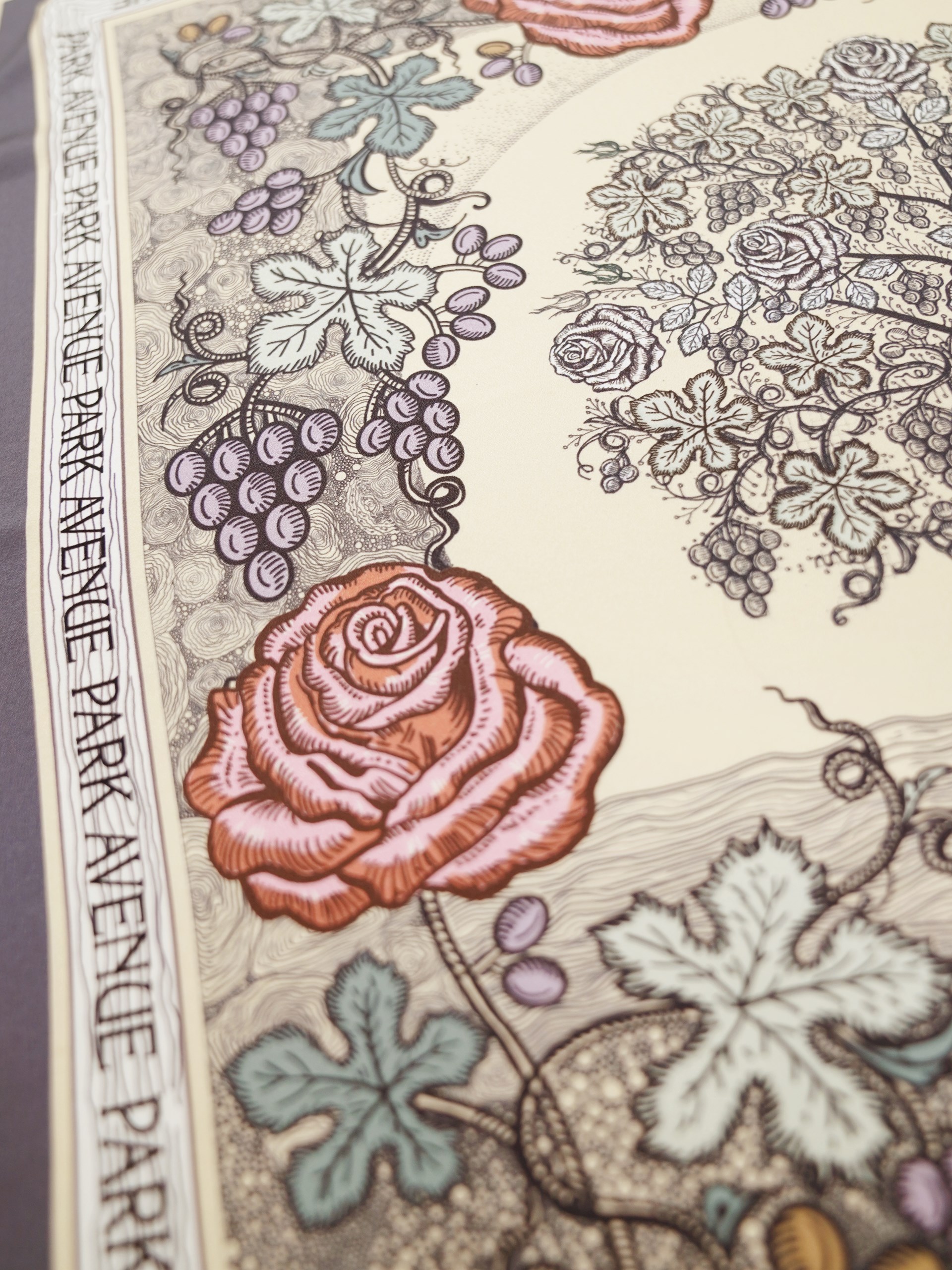 Park Avenue Atelier beige scarf with a graphic author's pattern