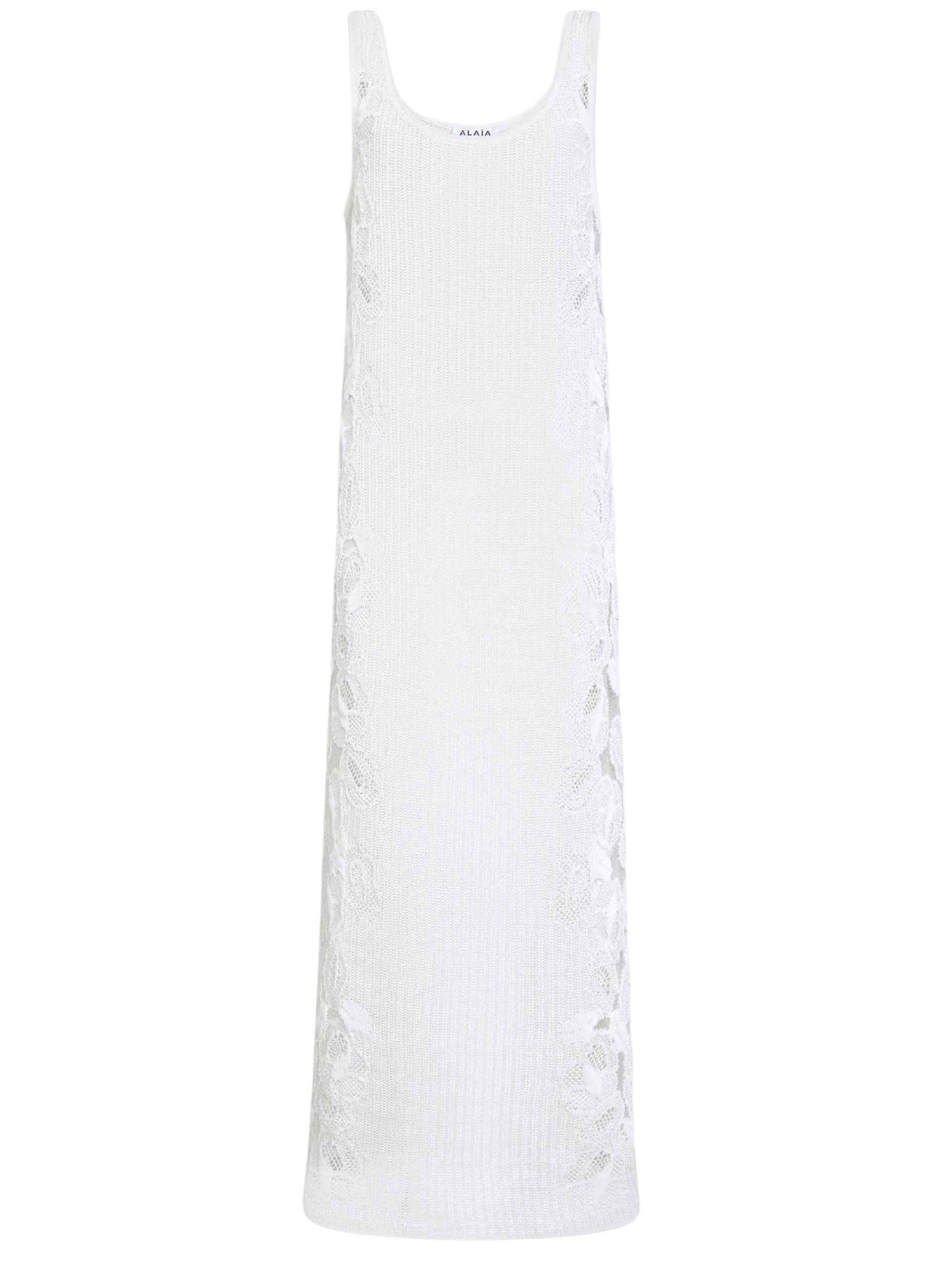 White knitted dress by Alaia with lace inserts