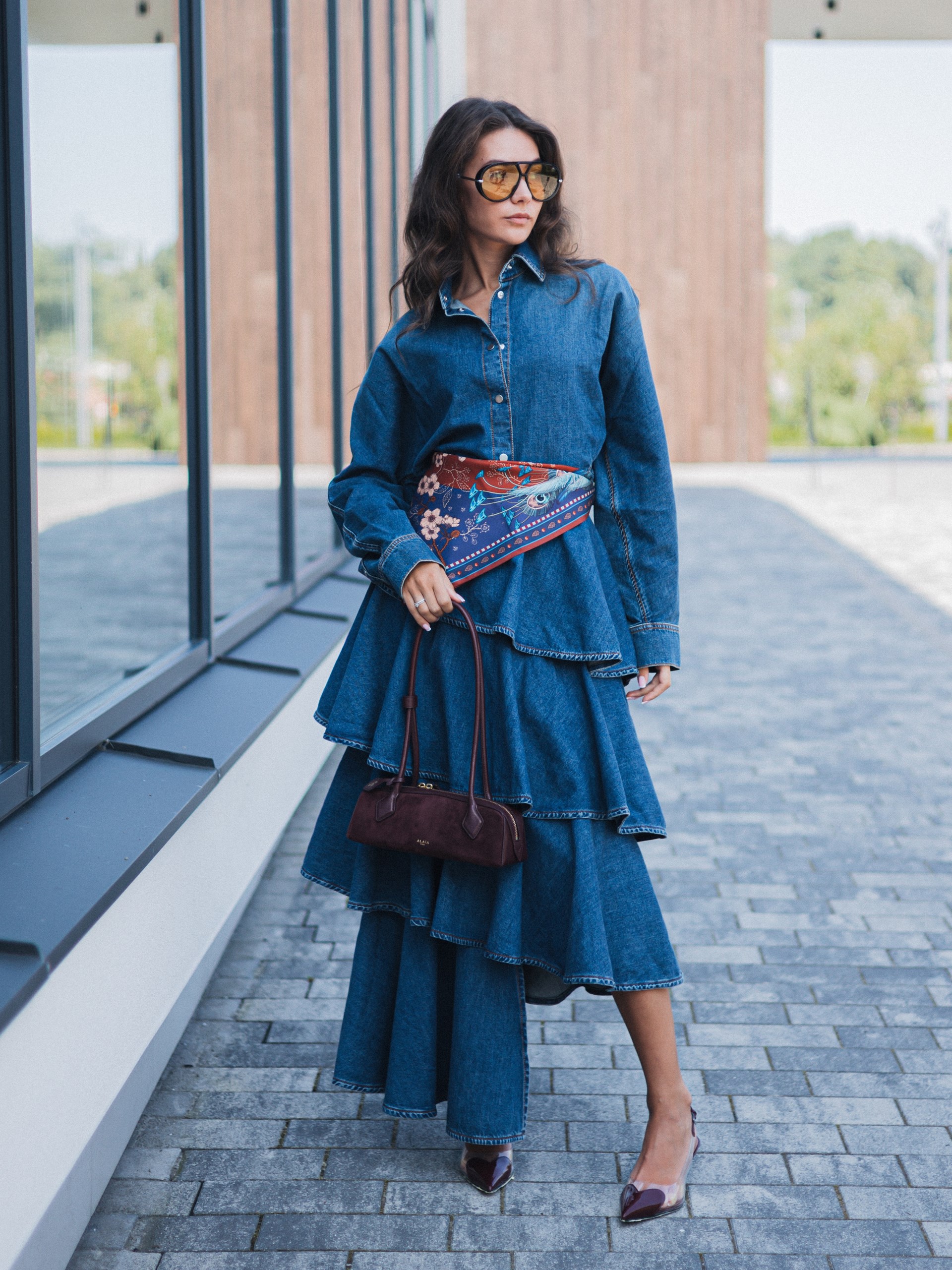 Alaia blue denim skirt with an asymmetrical cut