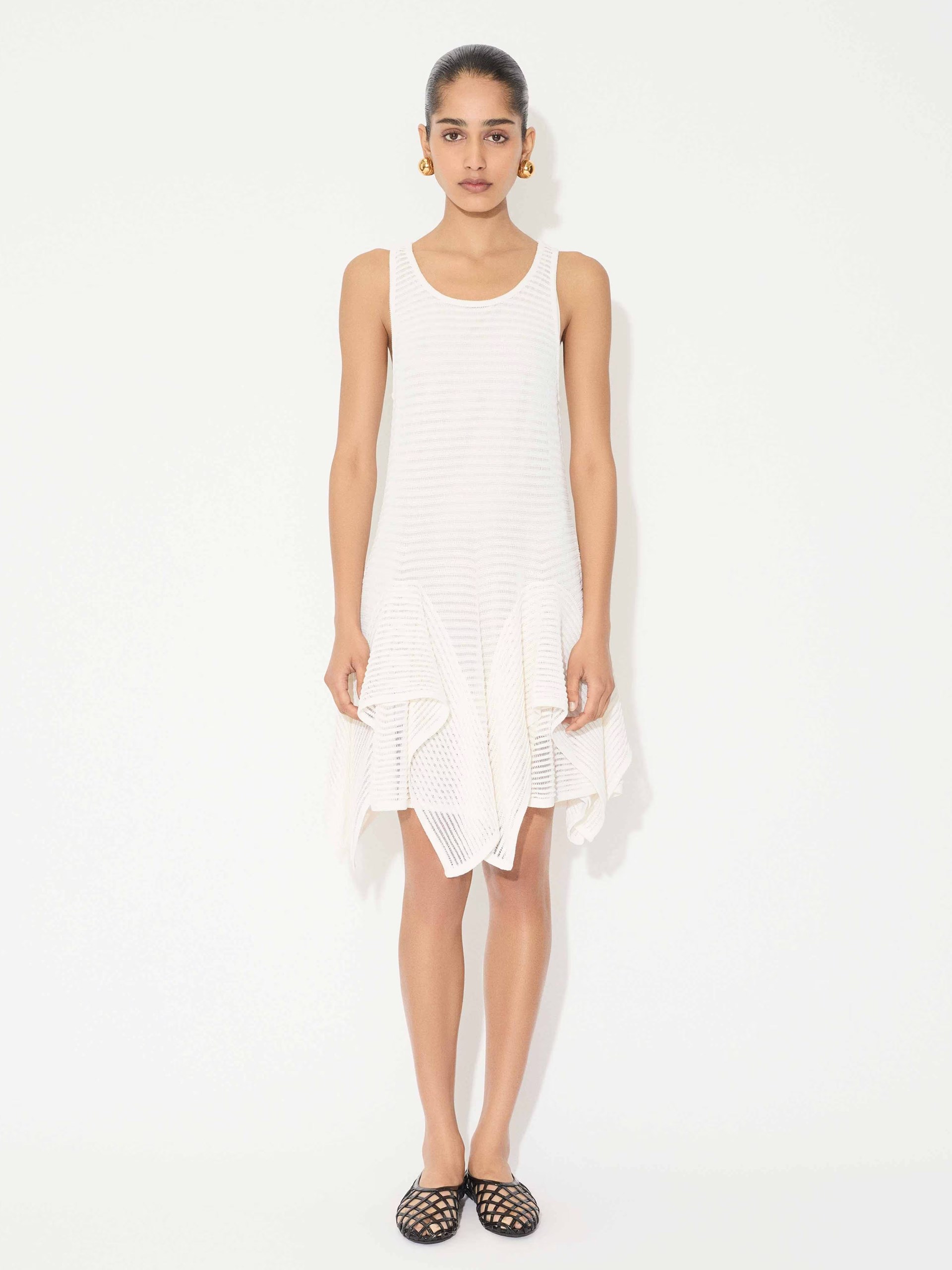 Alaia white knitted dress with ruffles