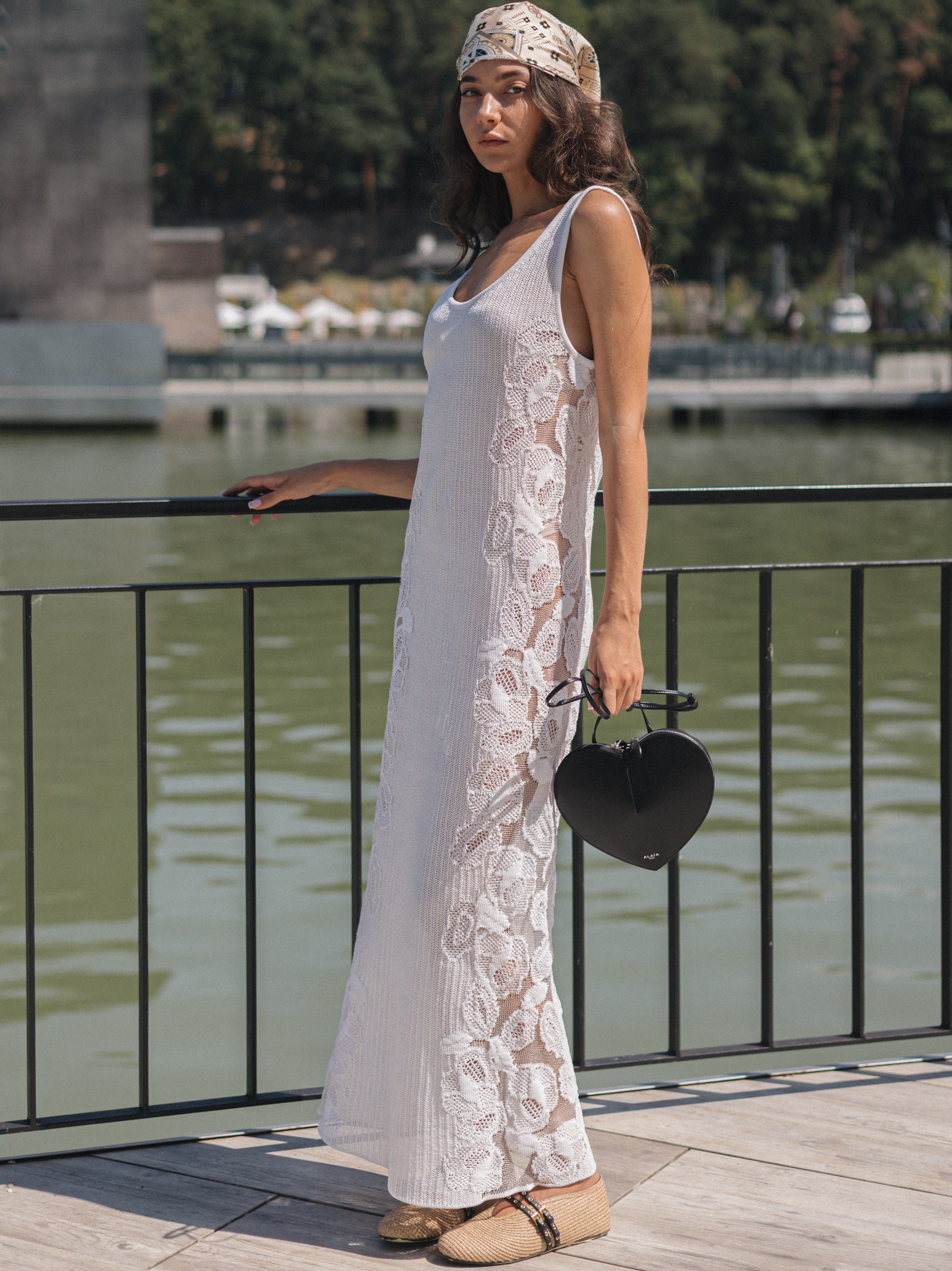 White knitted dress by Alaia with lace inserts