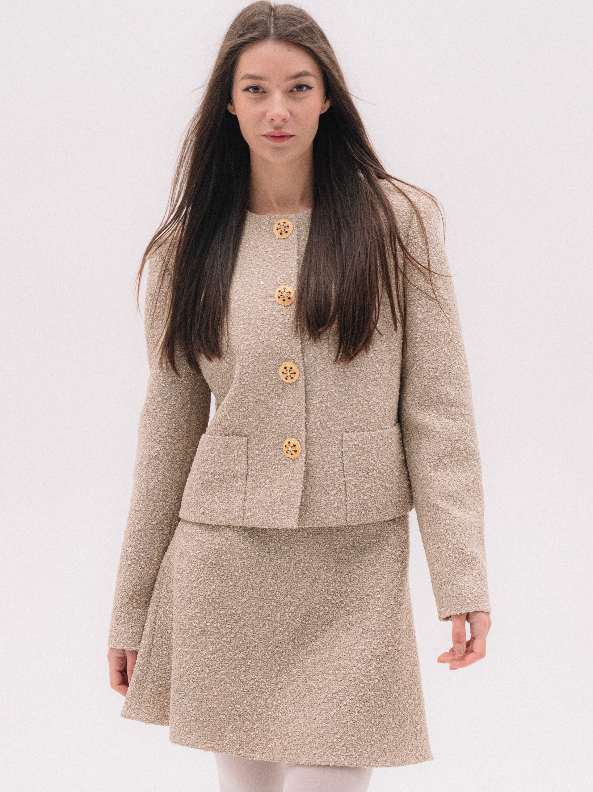 Park Avenue beige suit decorated with golden buttons