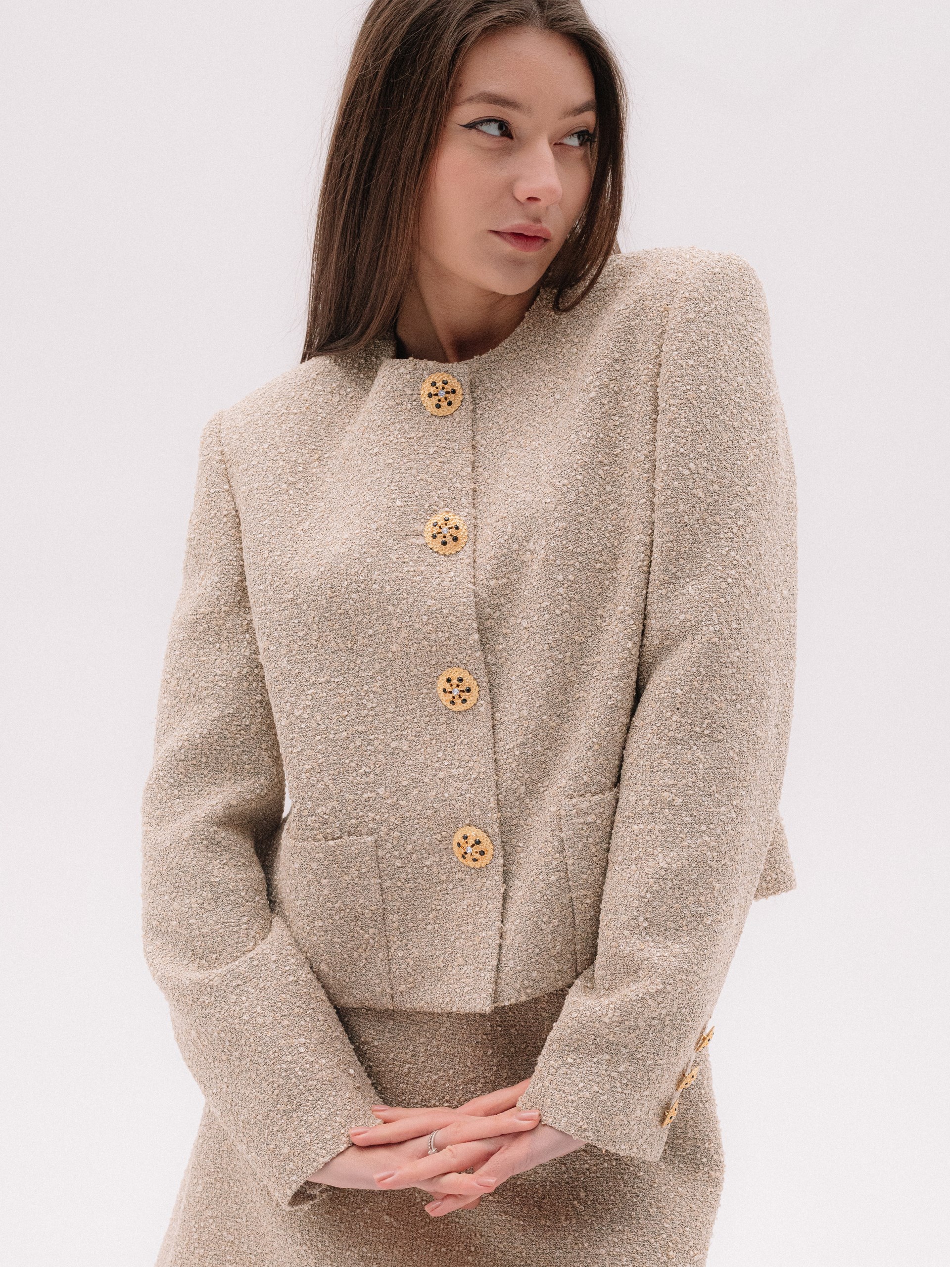 Park Avenue beige suit decorated with golden buttons