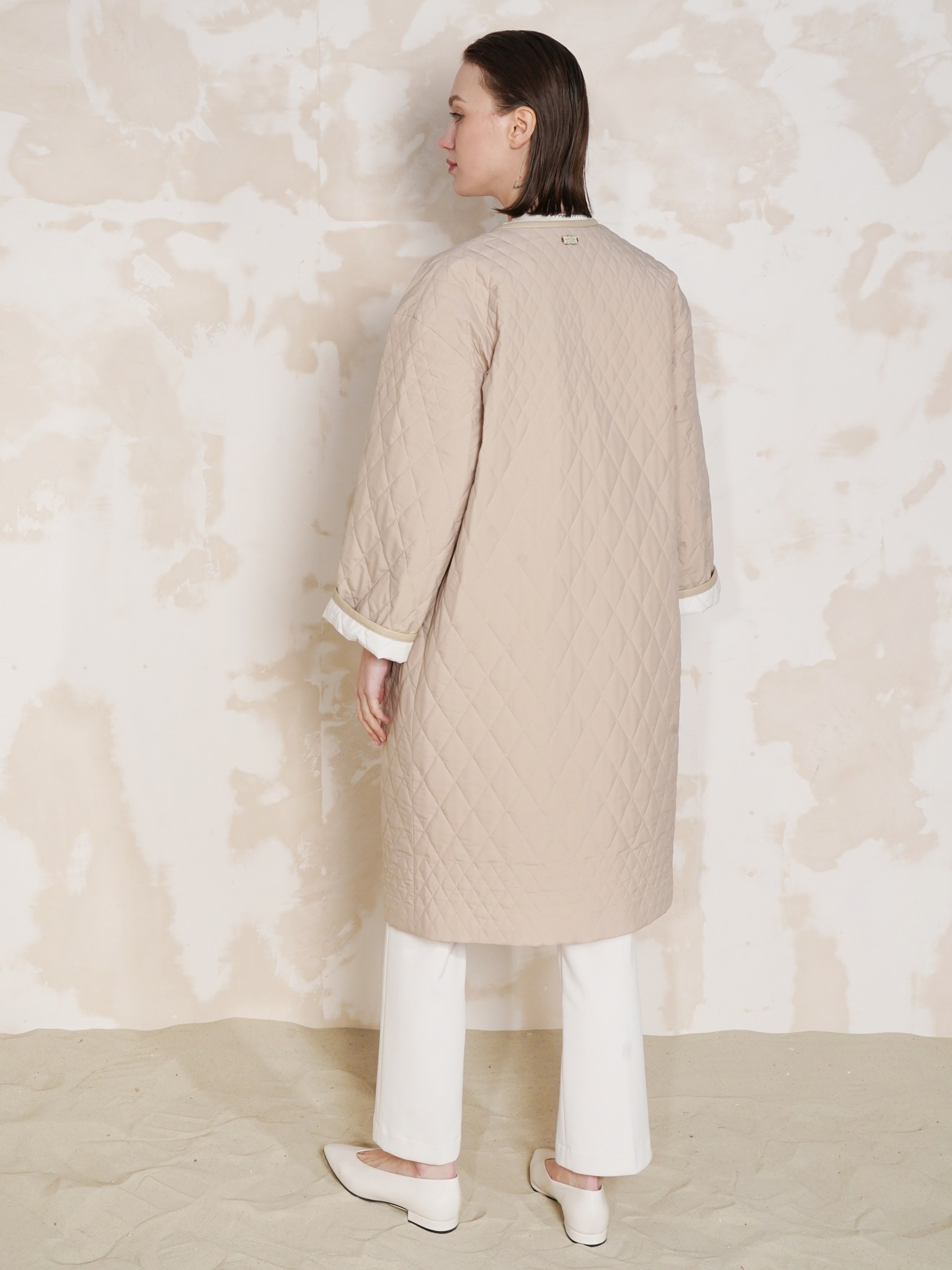 Agnona beige quilted coat with leather details