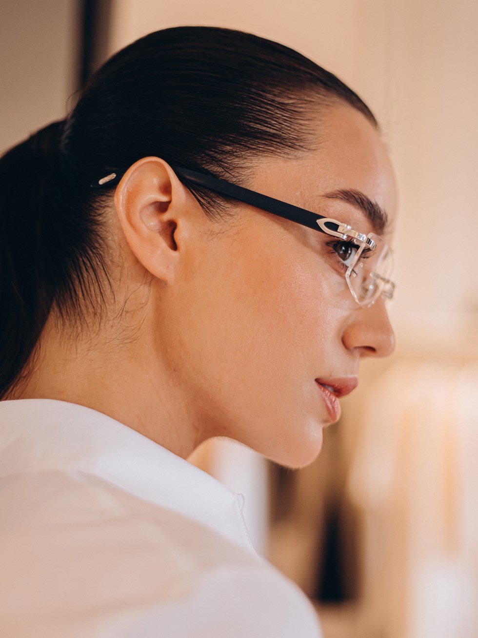 Cartier rimless glasses with rectangular lenses and blue frames