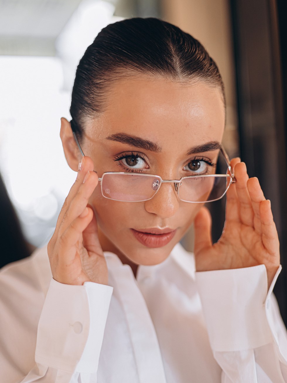 Cartier silver rectangular glasses with clear lenses