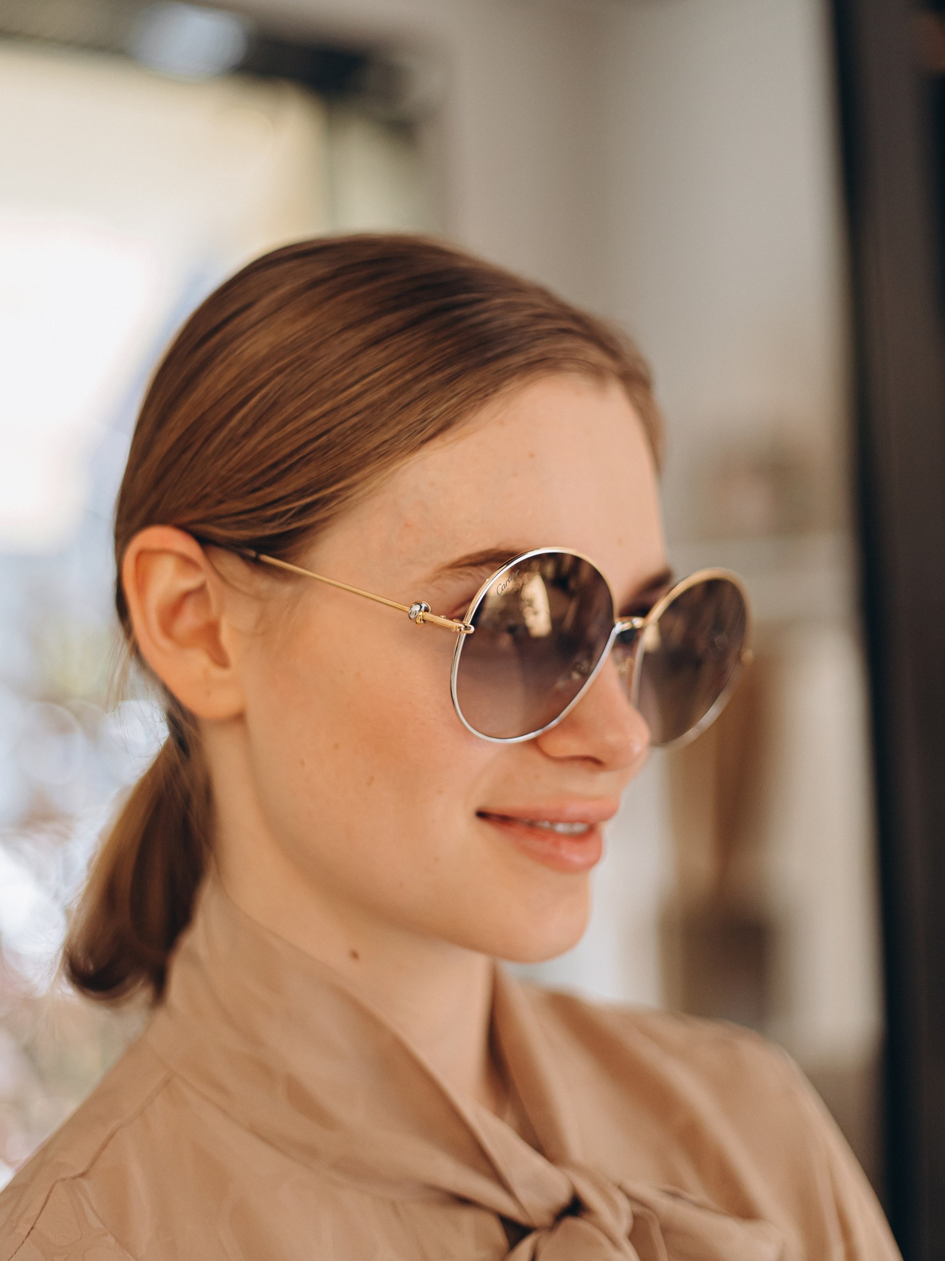 Cartier gold sunglasses with blue gray lenses