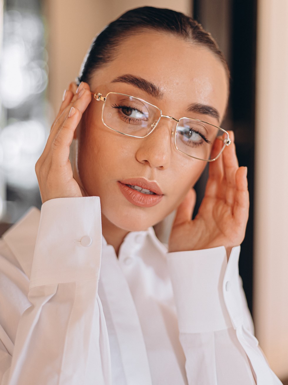 Cartier gold rectangular glasses with clear lenses
