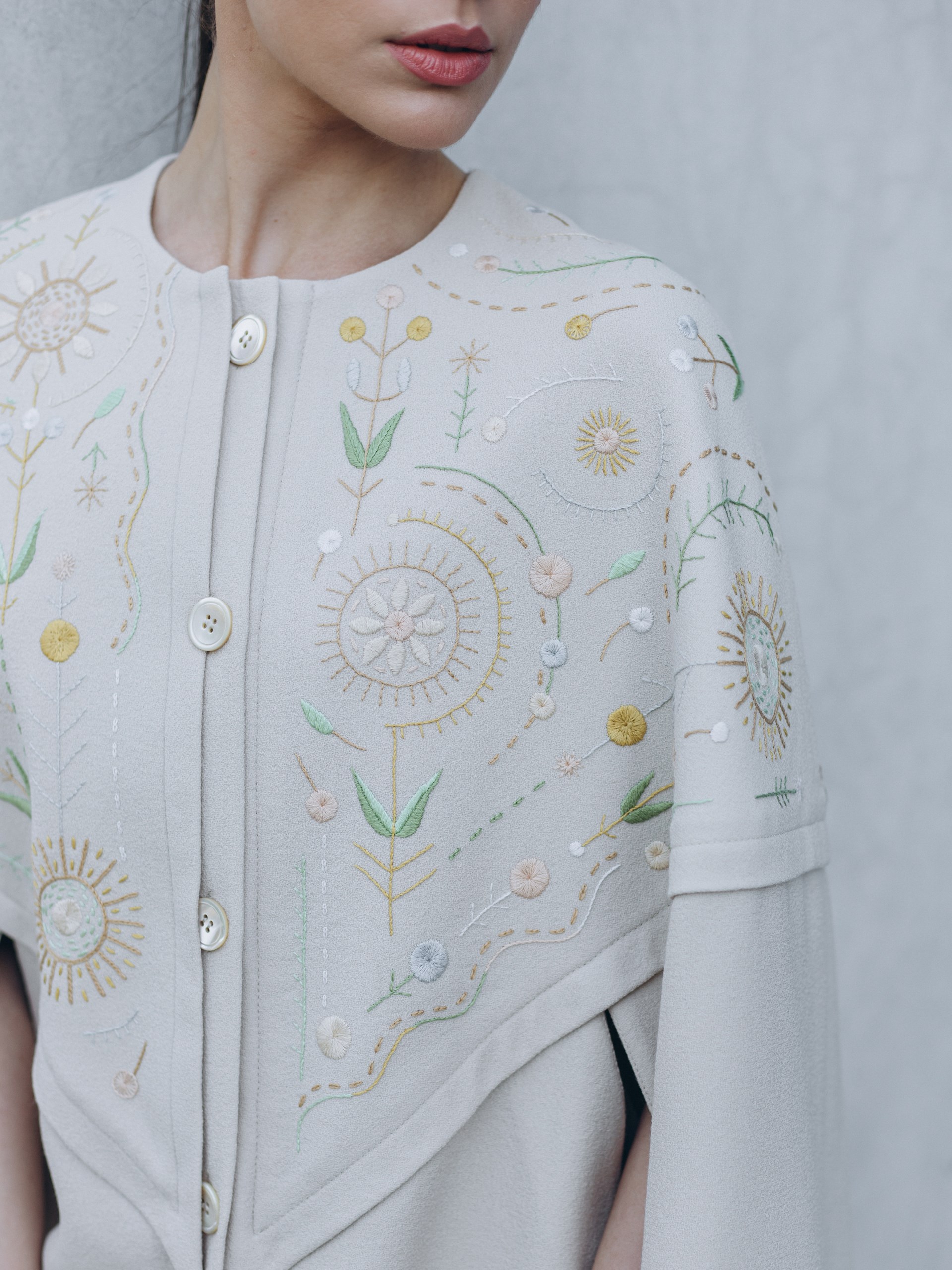 Park Avenue Atelier ivory cape with handmade elements