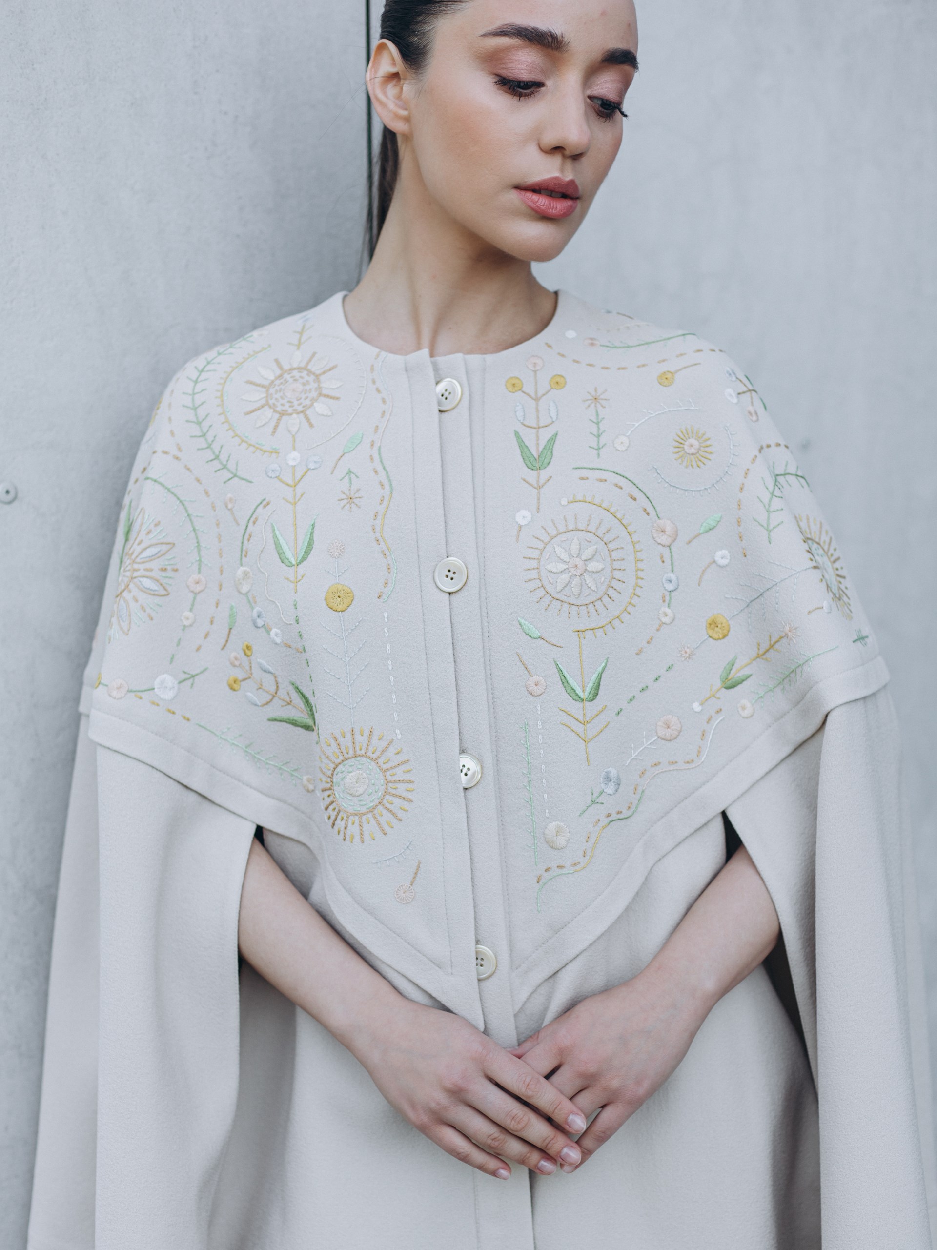 Park Avenue Atelier ivory cape with handmade elements