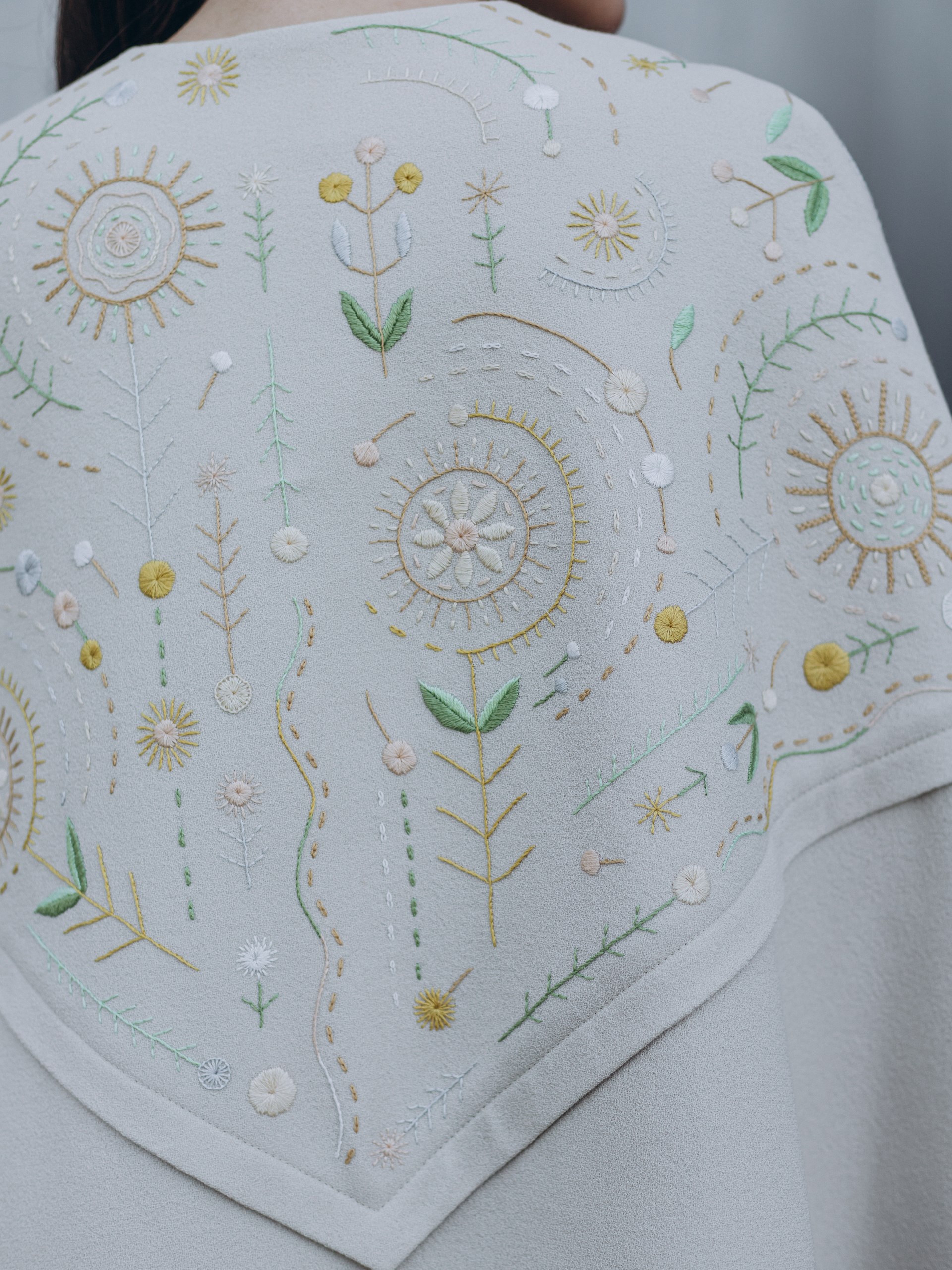 Park Avenue Atelier ivory cape with handmade elements