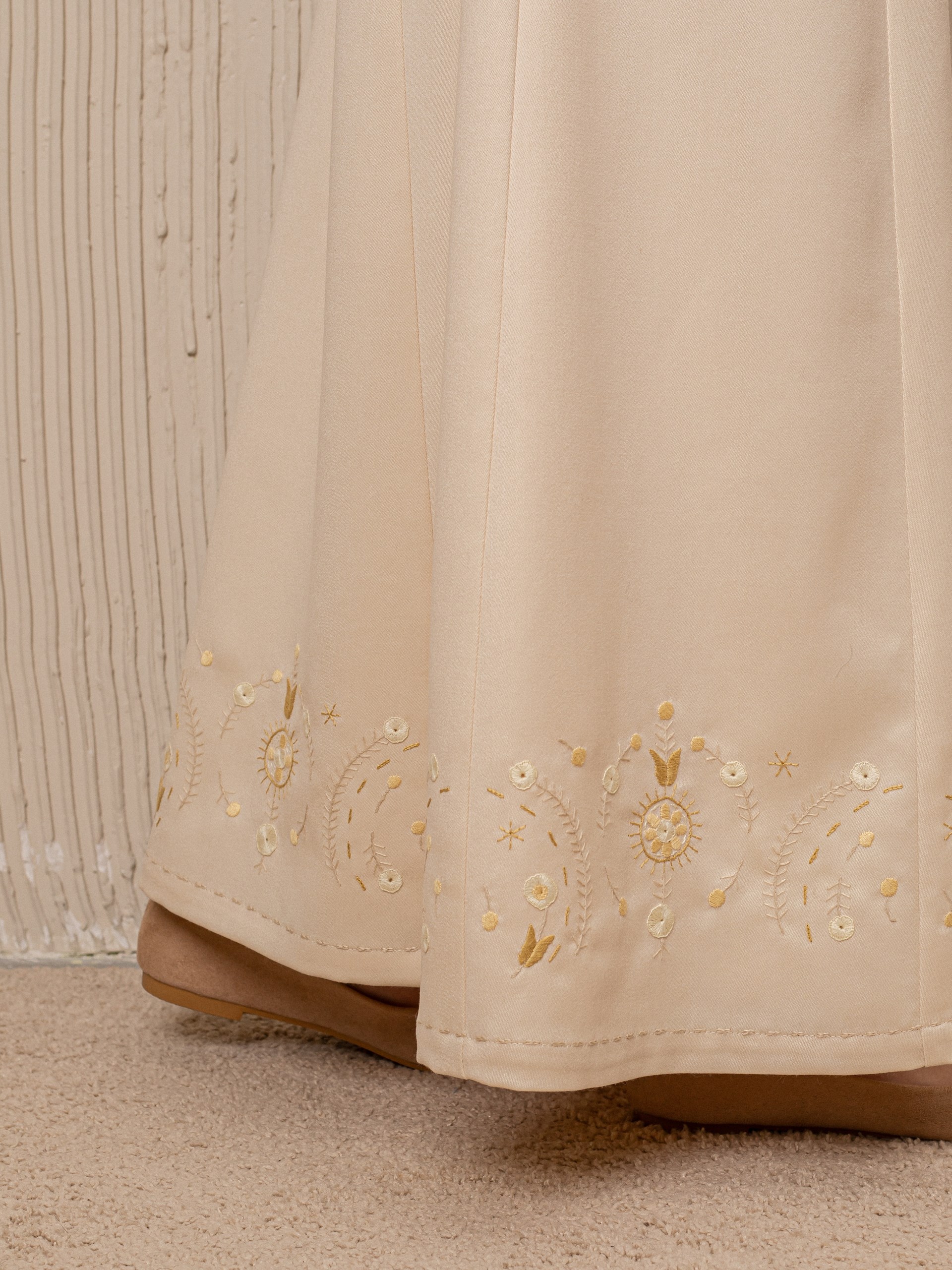 Park Avenue Atelier dress with hand-stitched embroidery