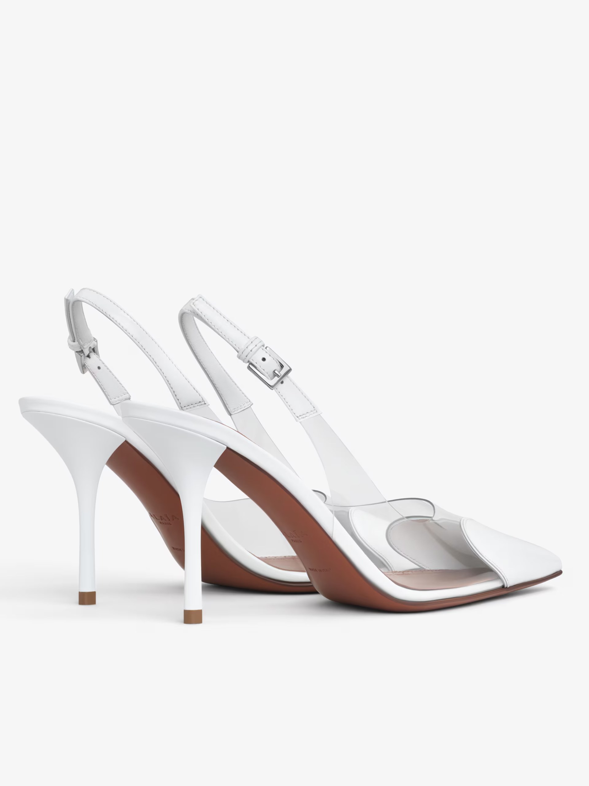 White slingbacks by Alaia LE CŒUR with transparent inserts