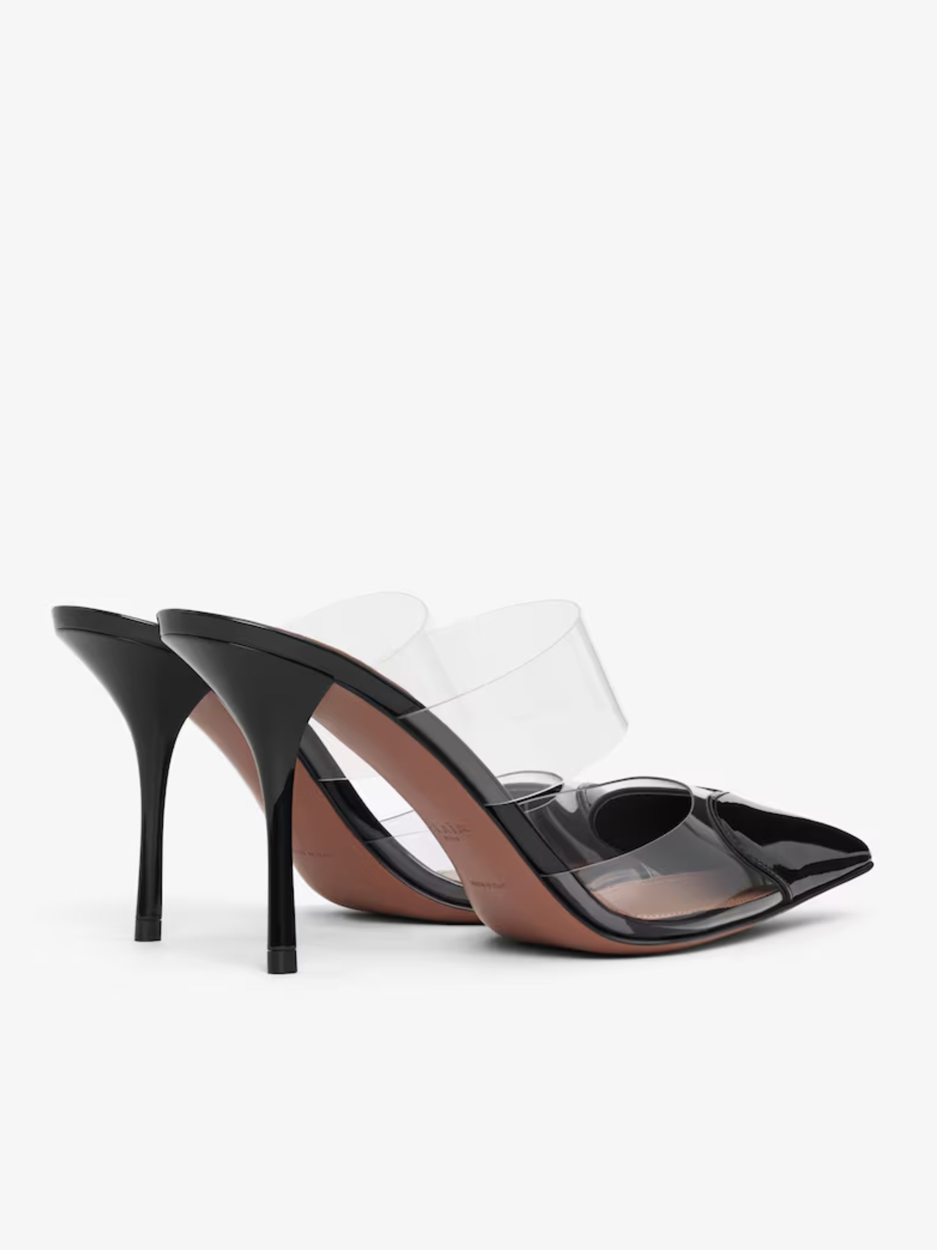 Black Alaia LE CŒUR mules with transparent inserts on the heels
