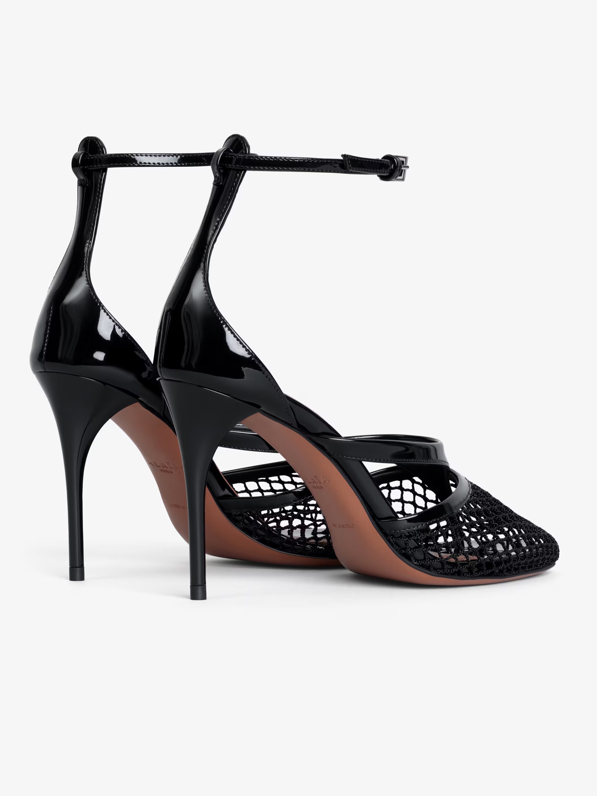 Black leather mesh heeled sandals by Alaia