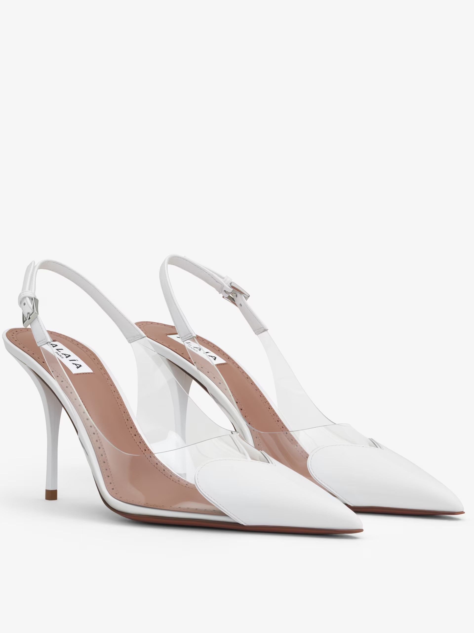 White slingbacks by Alaia LE CŒUR with transparent inserts
