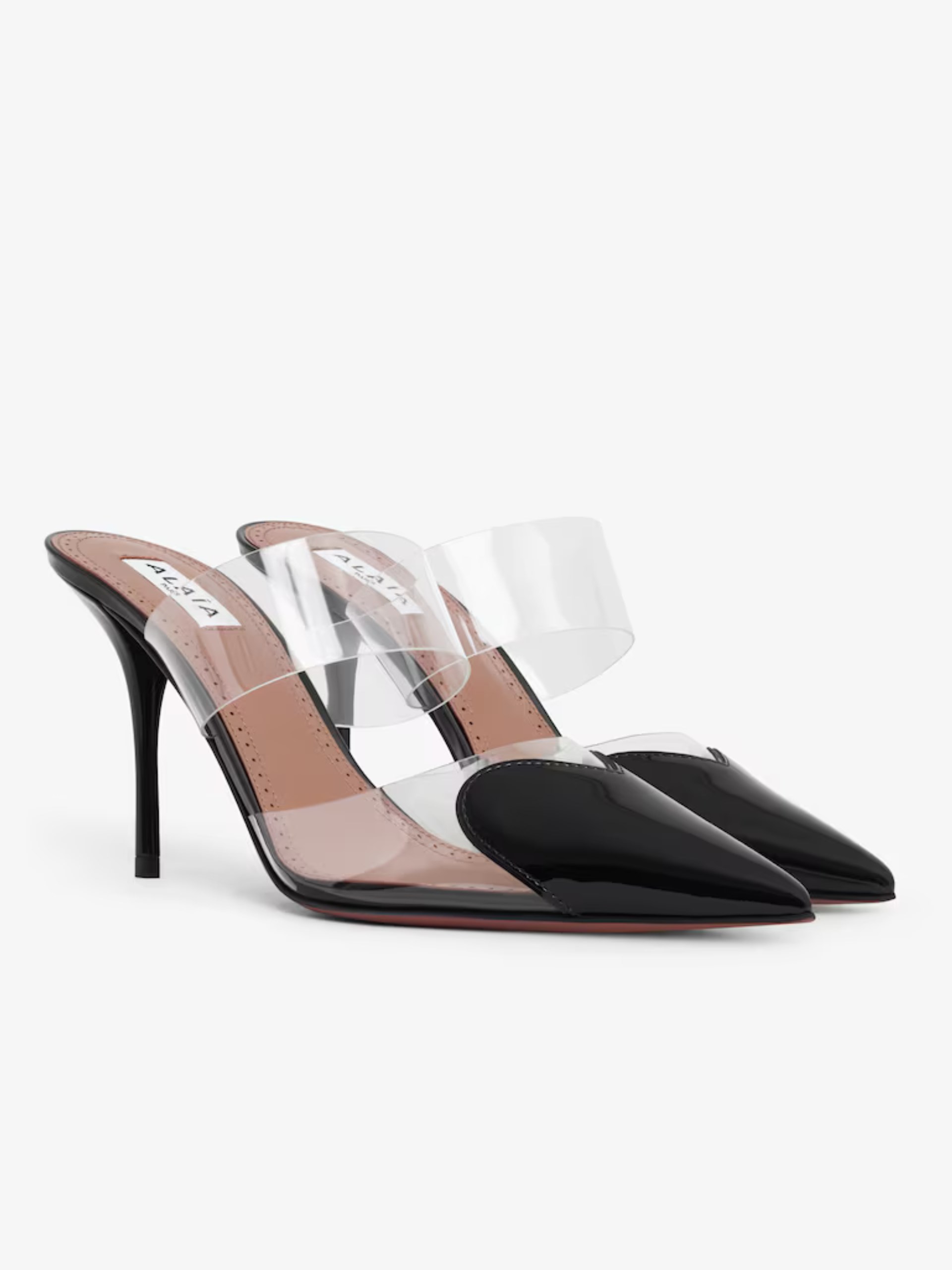 Black Alaia LE CŒUR mules with transparent inserts on the heels
