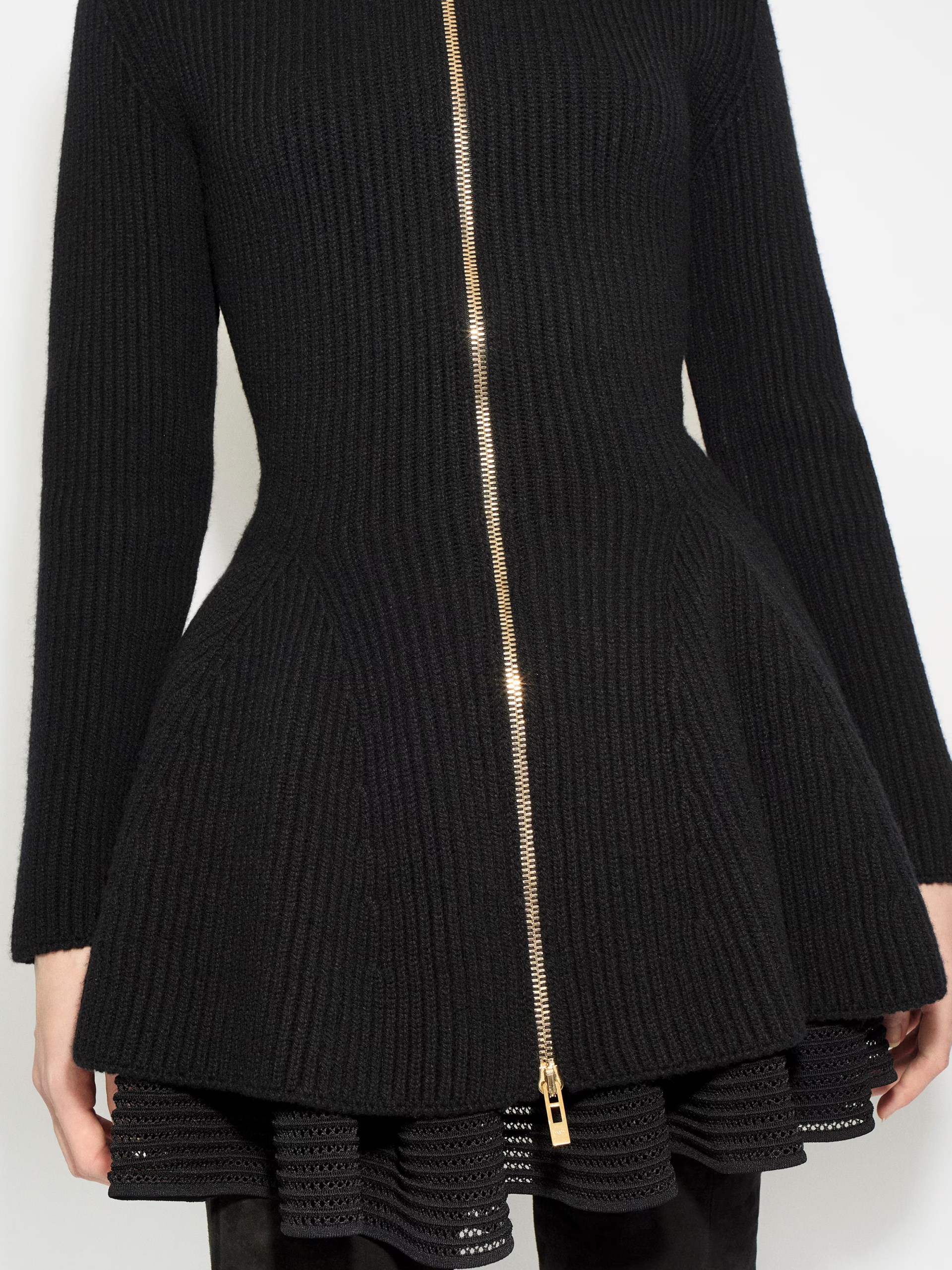 Black elongated cardigan in ribbed Alaia with zipper