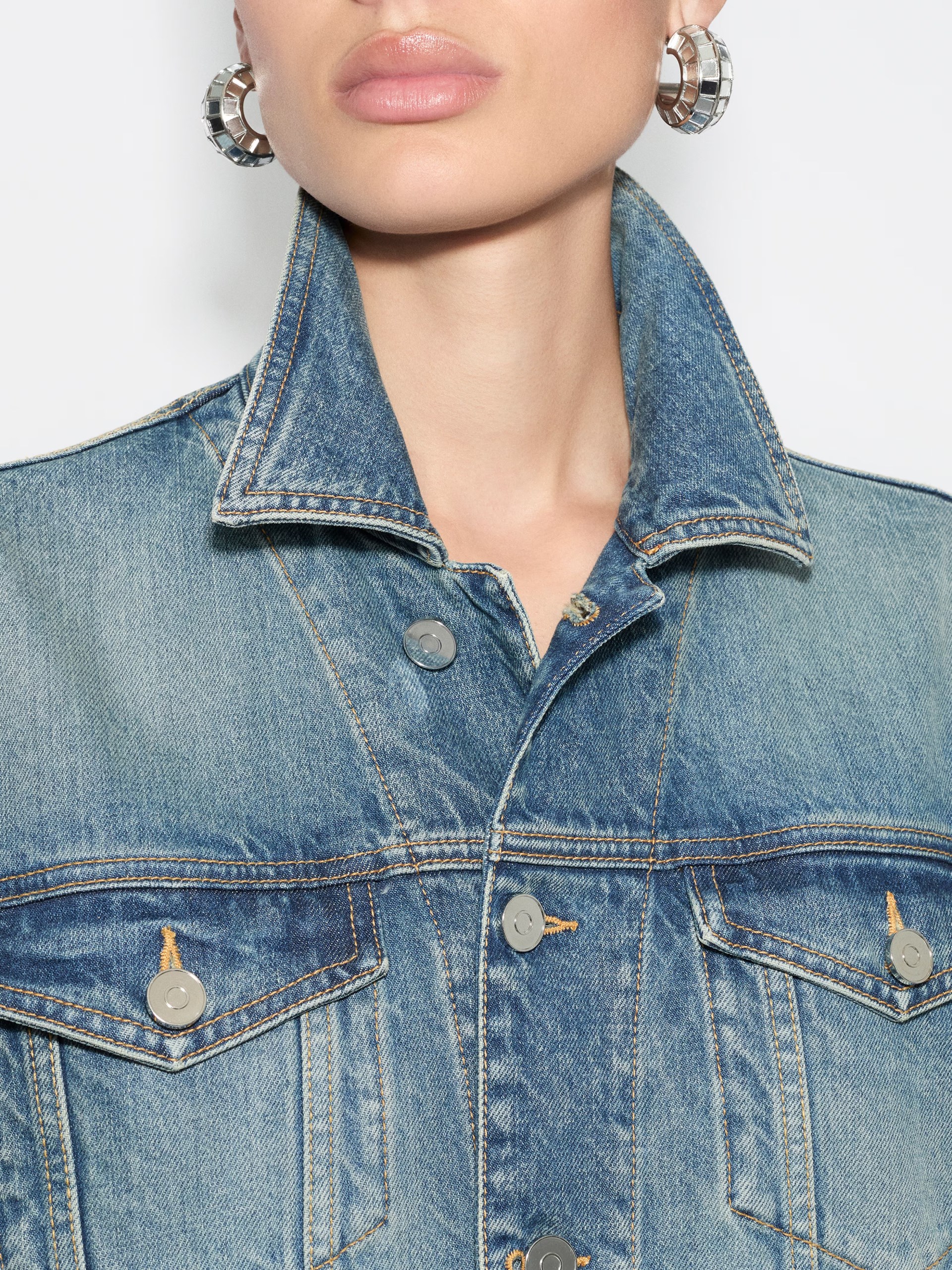 Alaia blue denim jacket with peplum