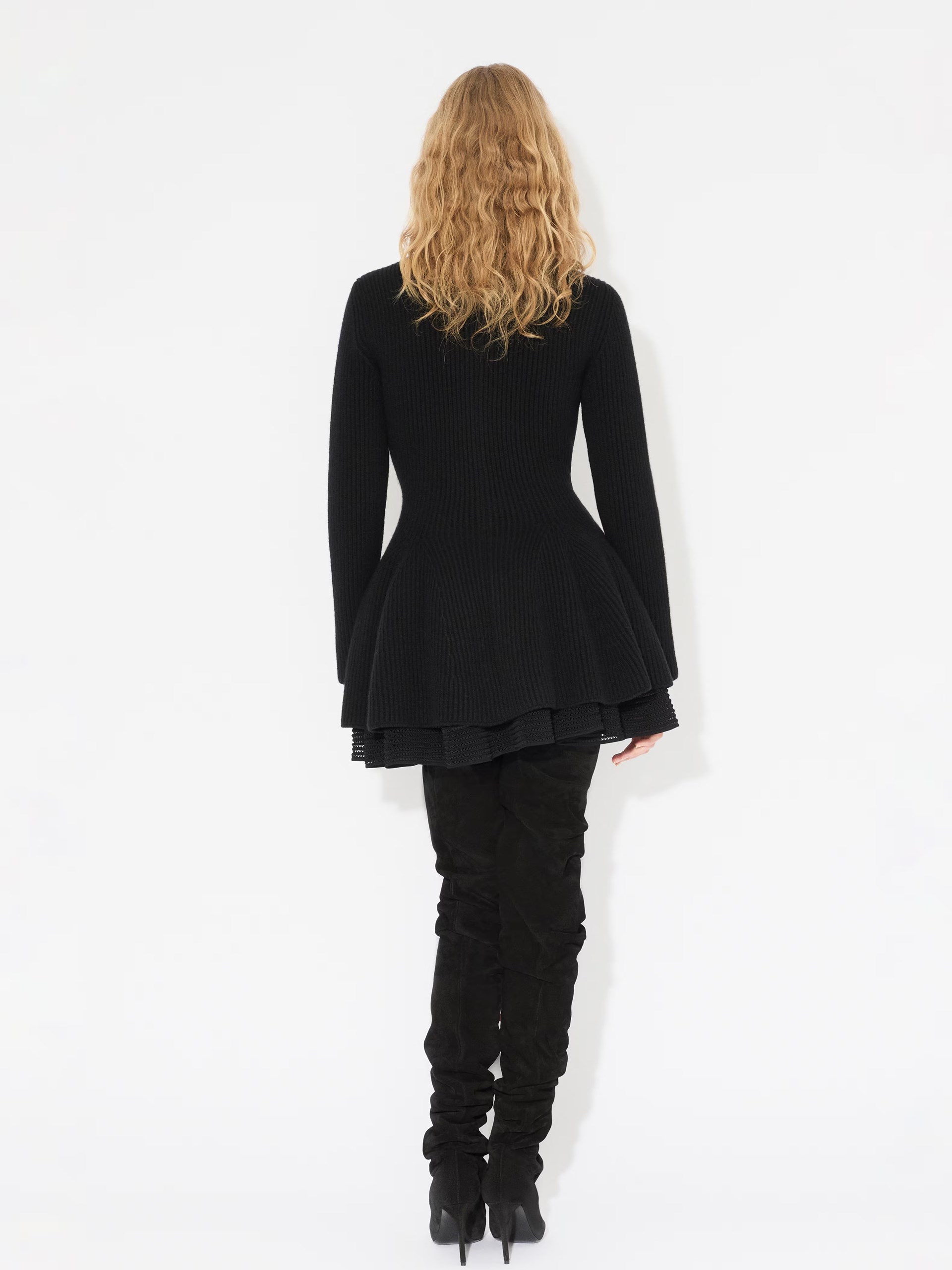 Black Alaia mini skirt with wide belt