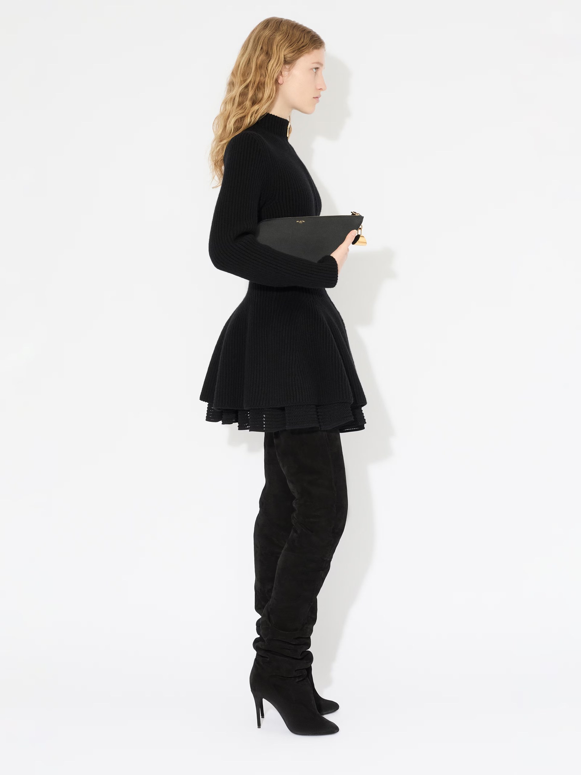Black Alaia mini skirt with wide belt