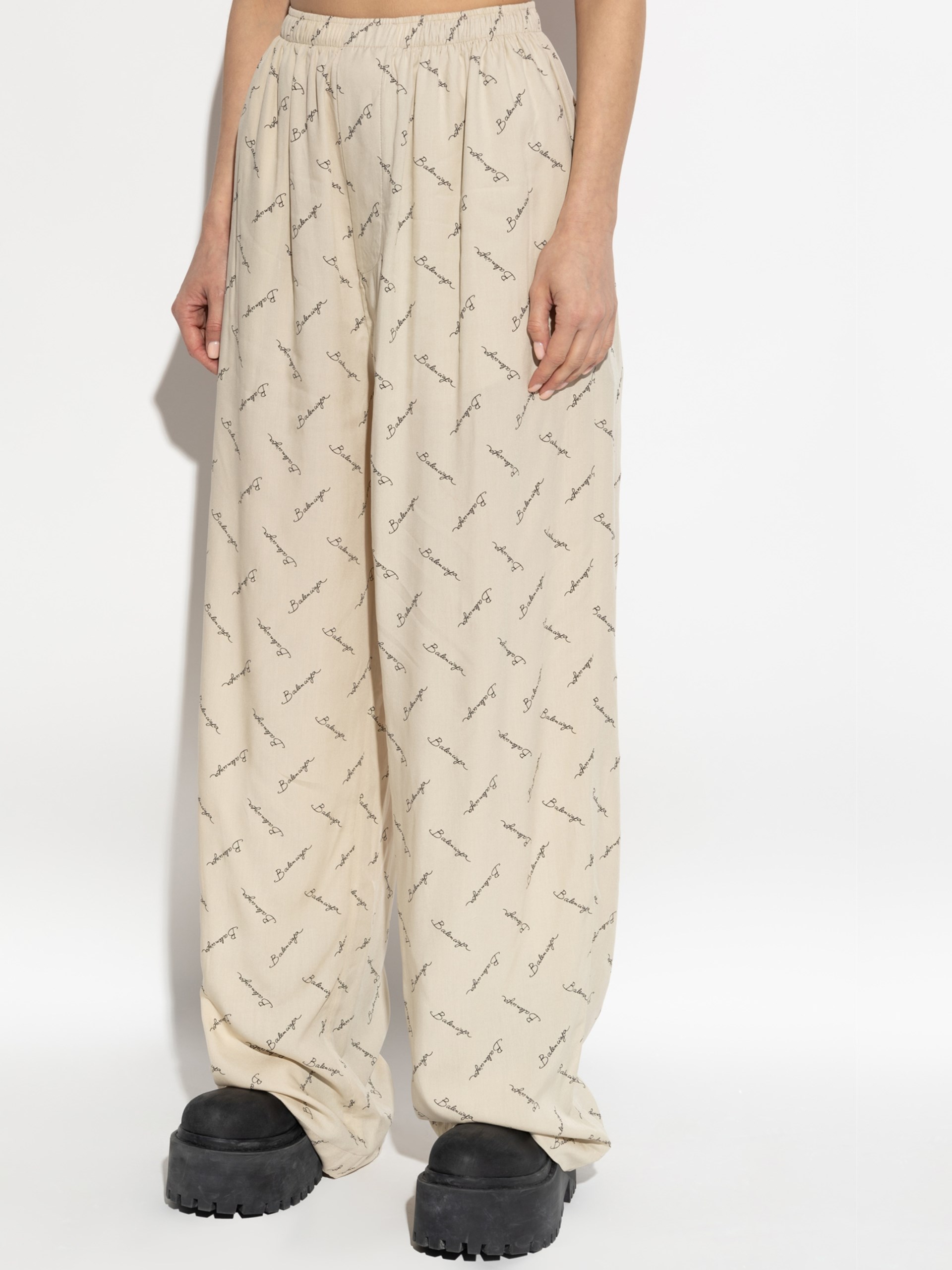 Balenciaga beige wide-leg pants with logo