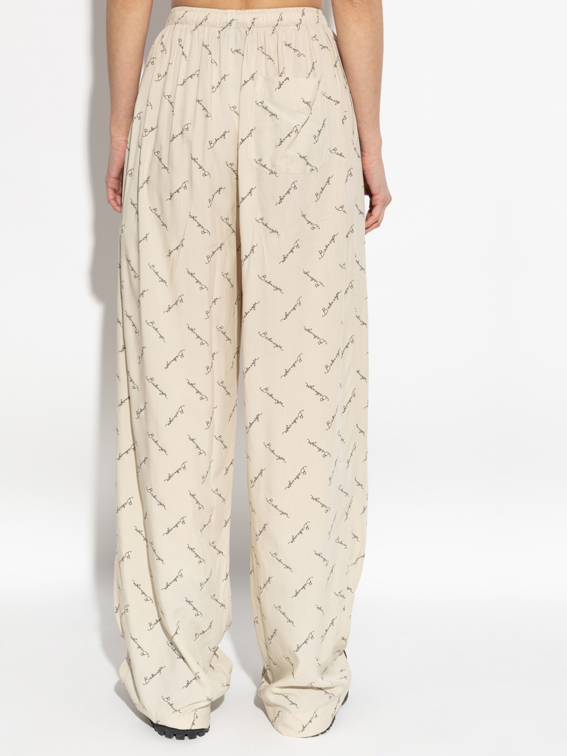 Balenciaga beige wide-leg pants with logo