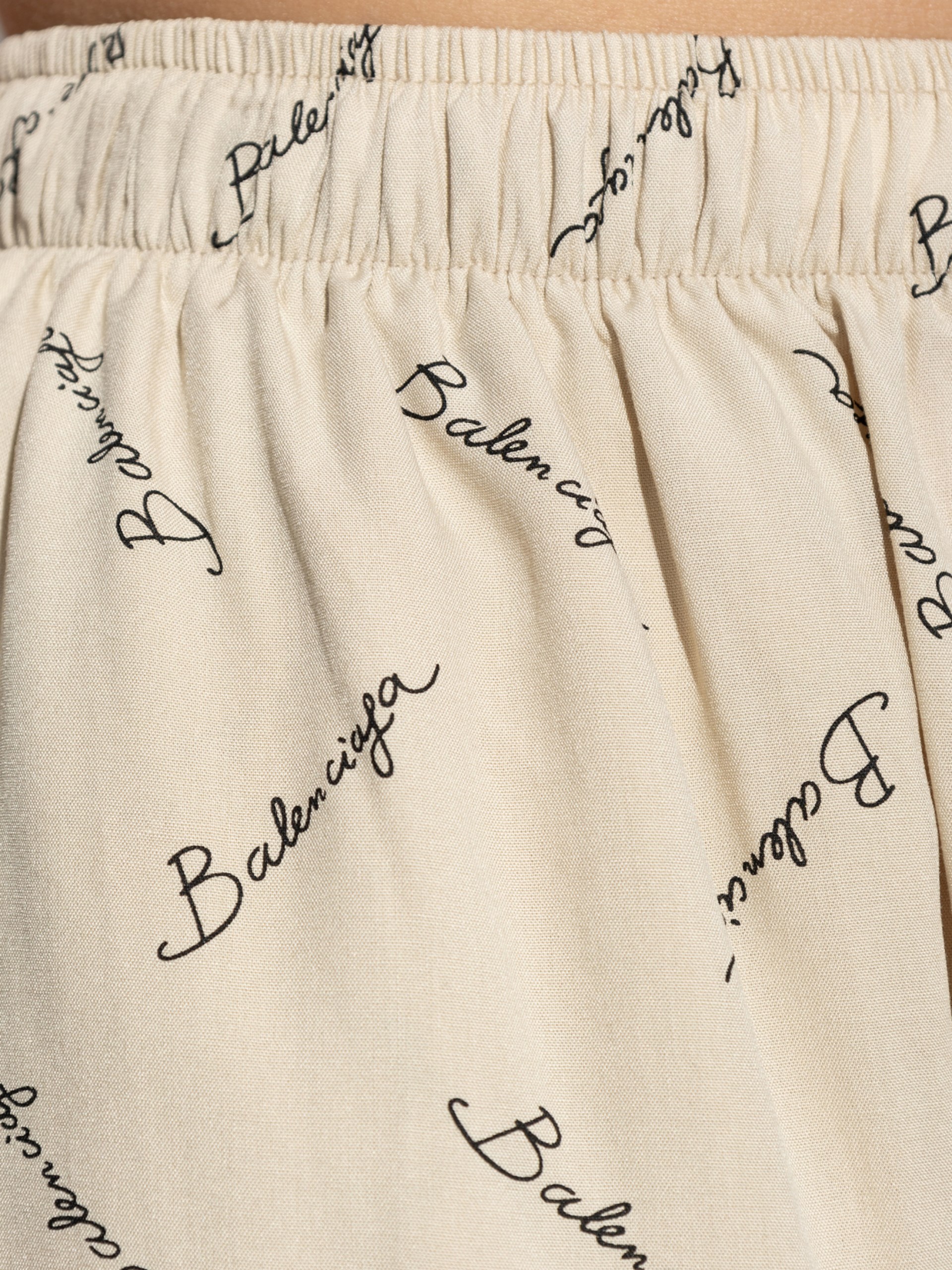 Balenciaga beige wide-leg pants with logo