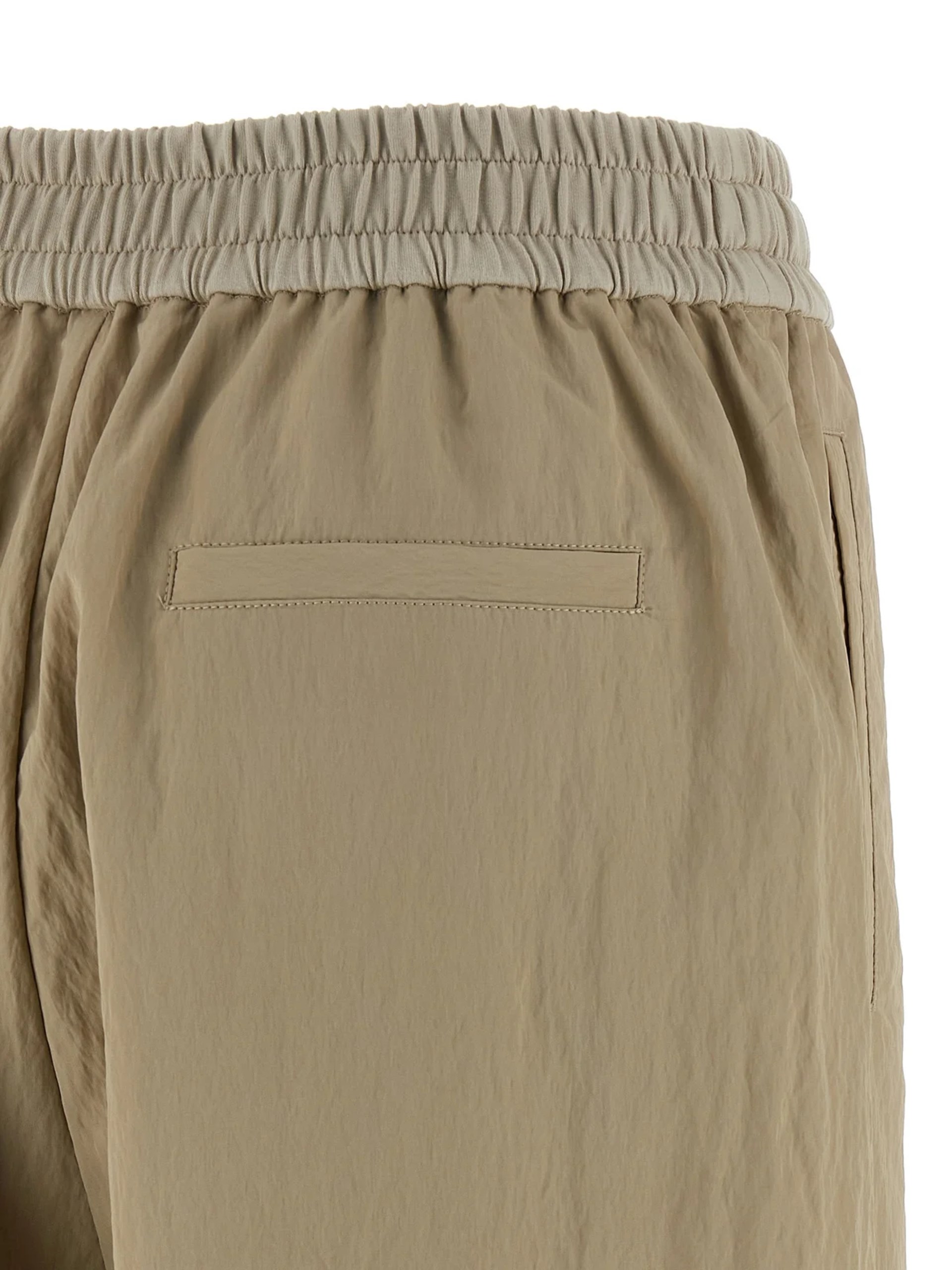 Brunello Cucinelli beige lace-up pants