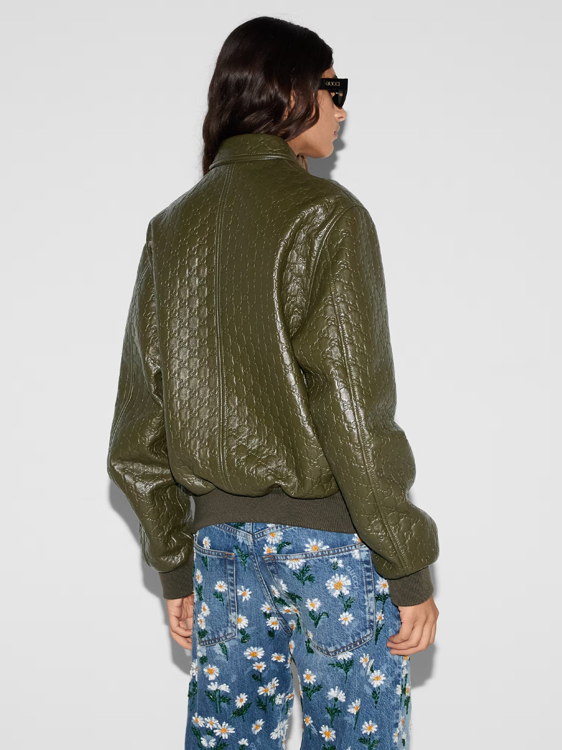 Gucci embossed GG leather bomber jacket