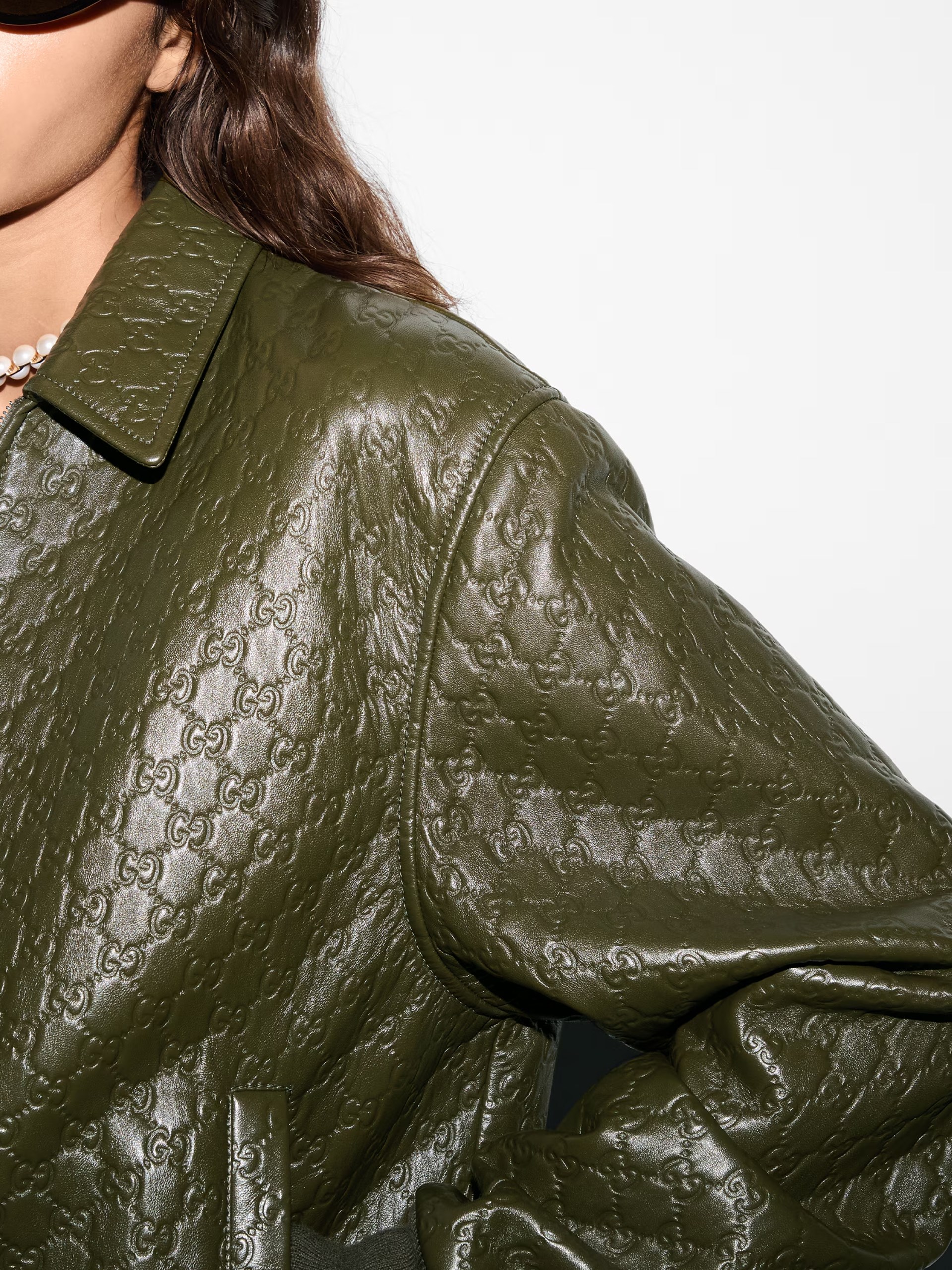 Gucci embossed GG leather bomber jacket