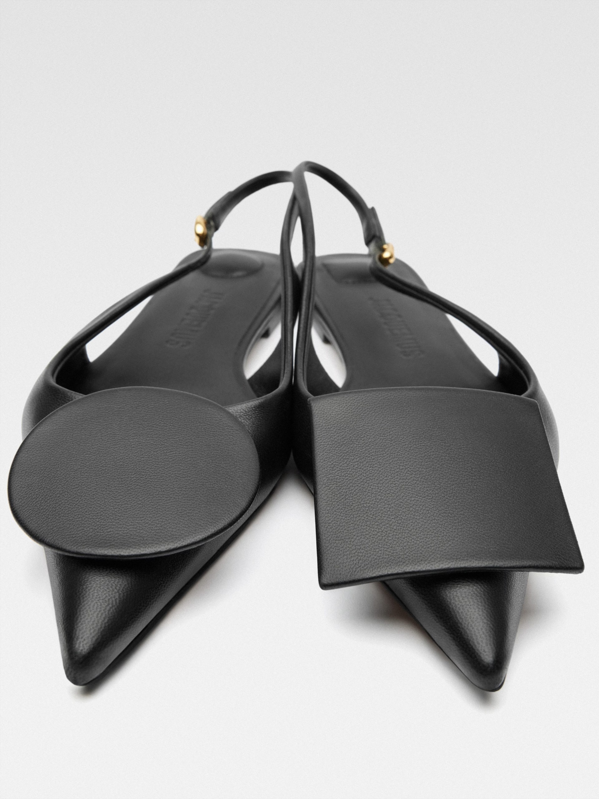 Jacquemus Duelo black leather mules