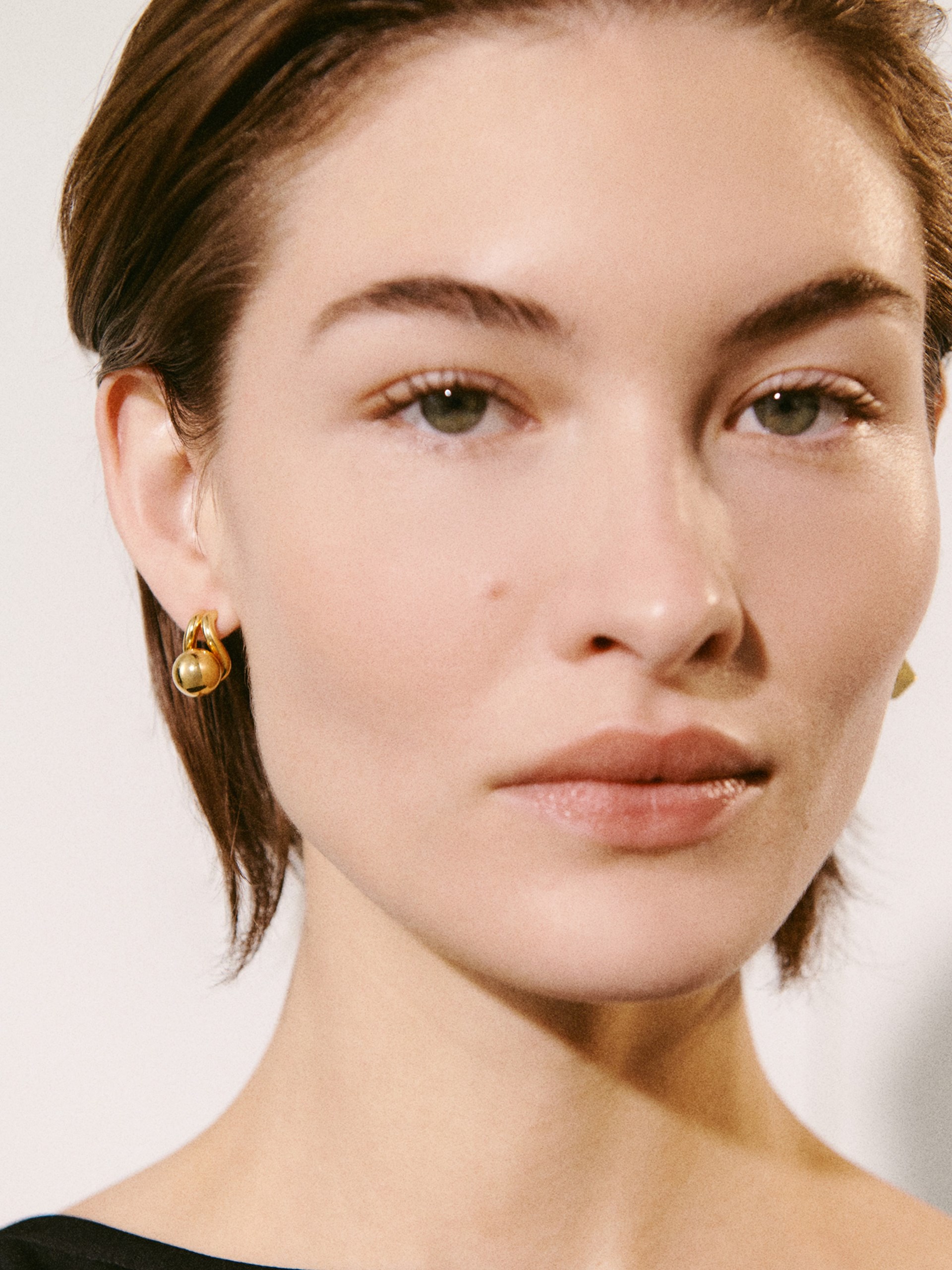 Jacquemus Nodo gold asymmetric earrings