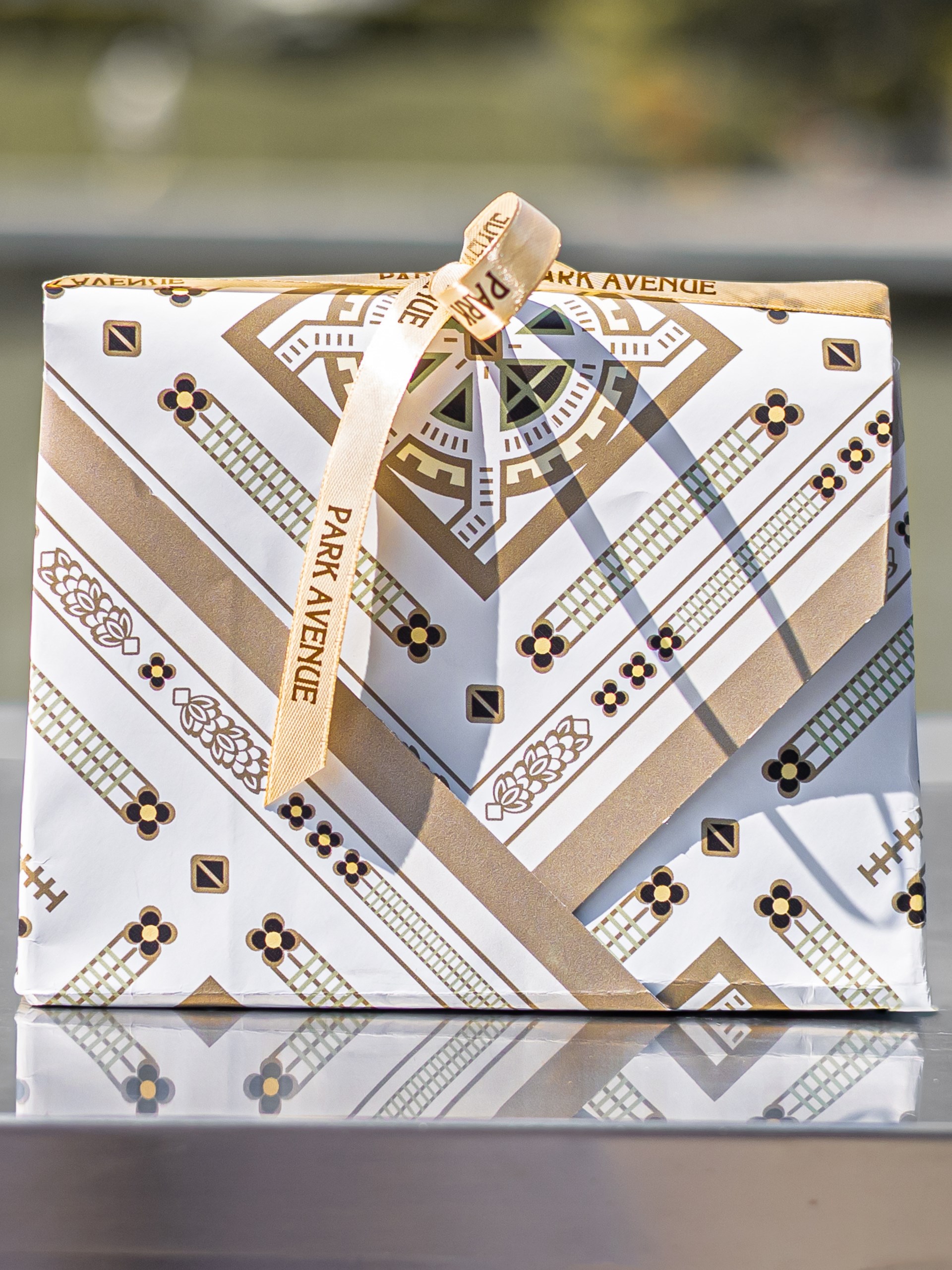 Park Avenue Atelier white scarf with original geometric print